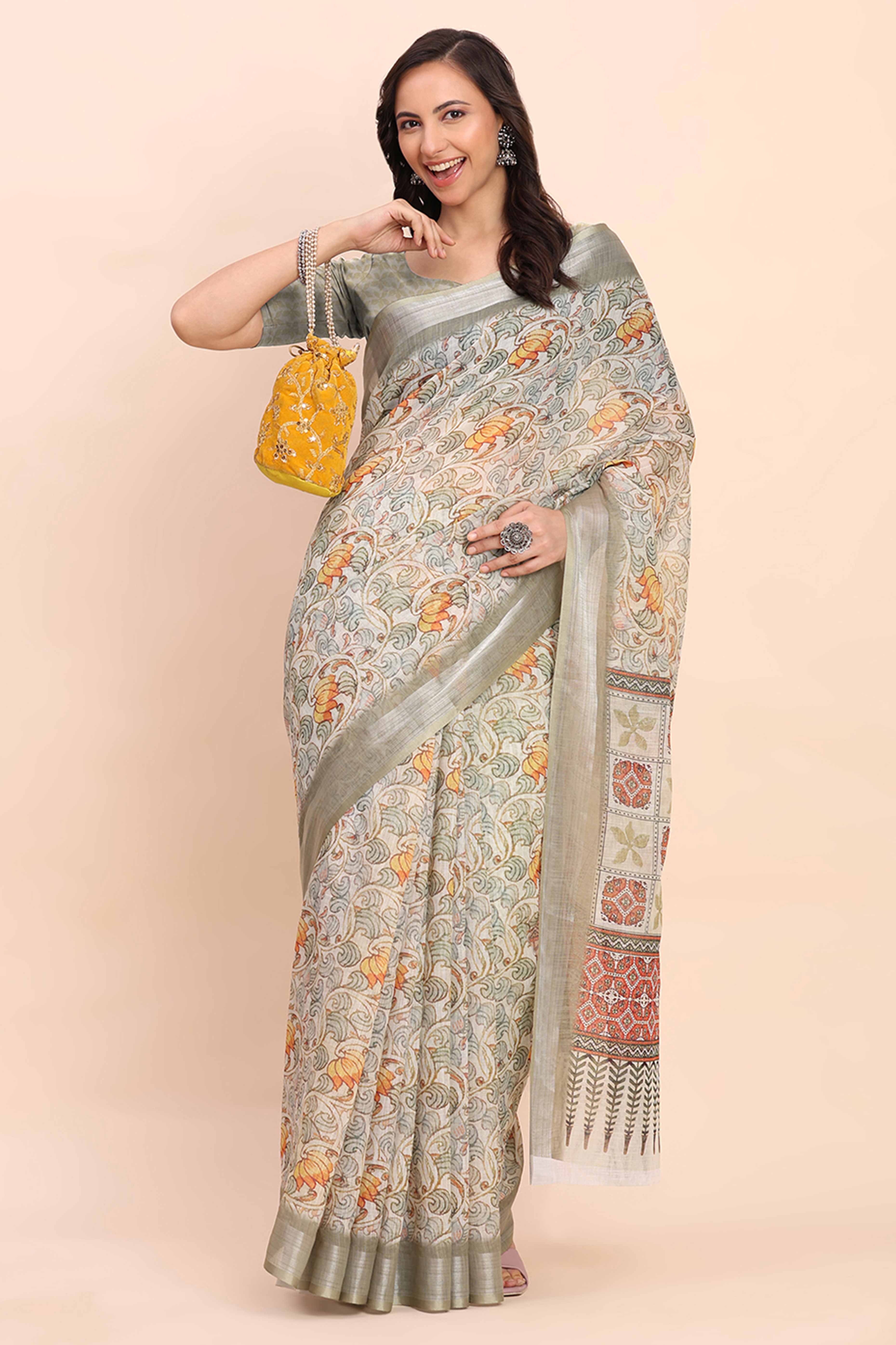 Light Green Linen Cotton Saree Featuring Floral Prints & Woven Border