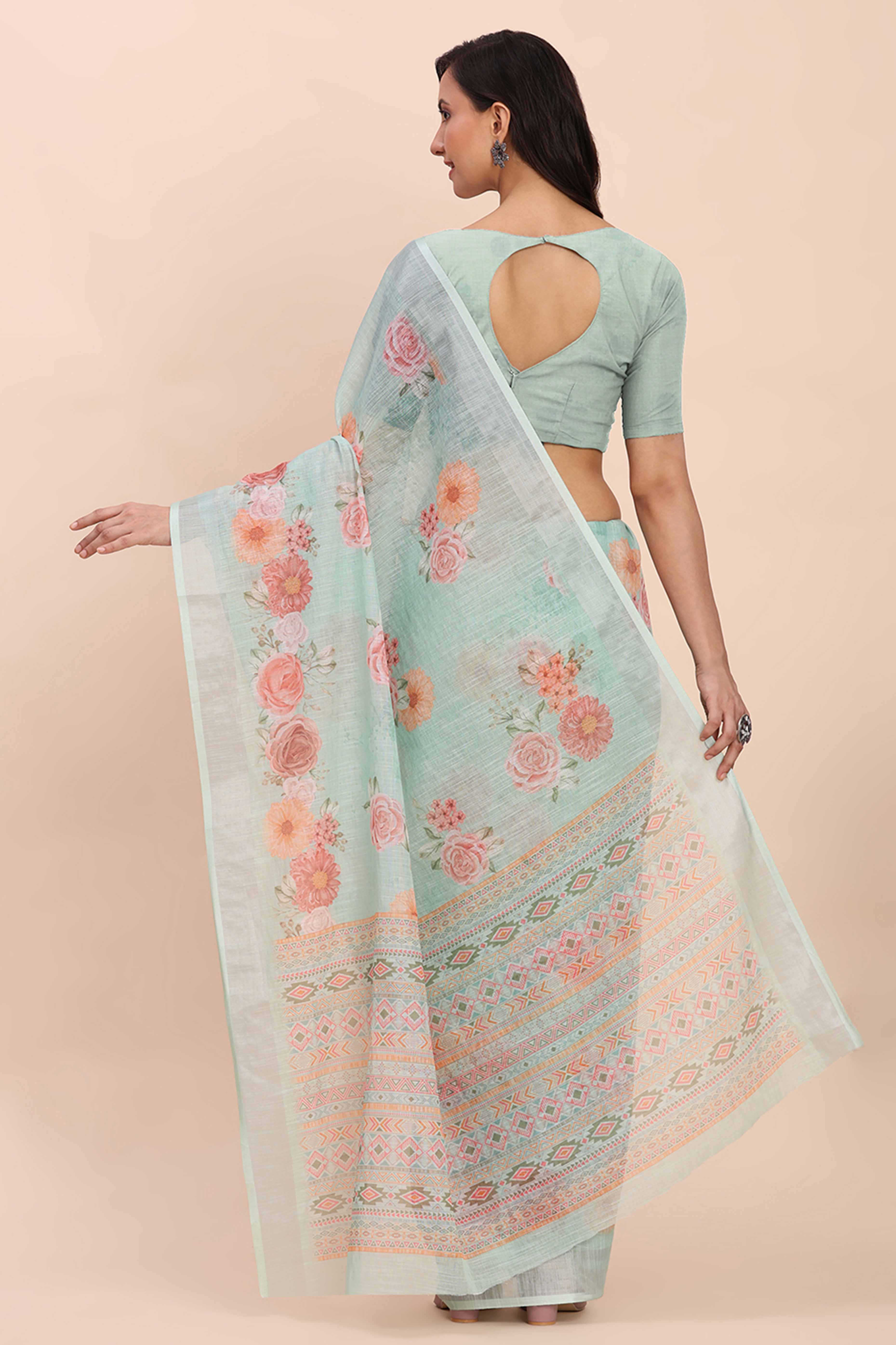 Sea Green Linen Saree with Intricate Silver Weaving