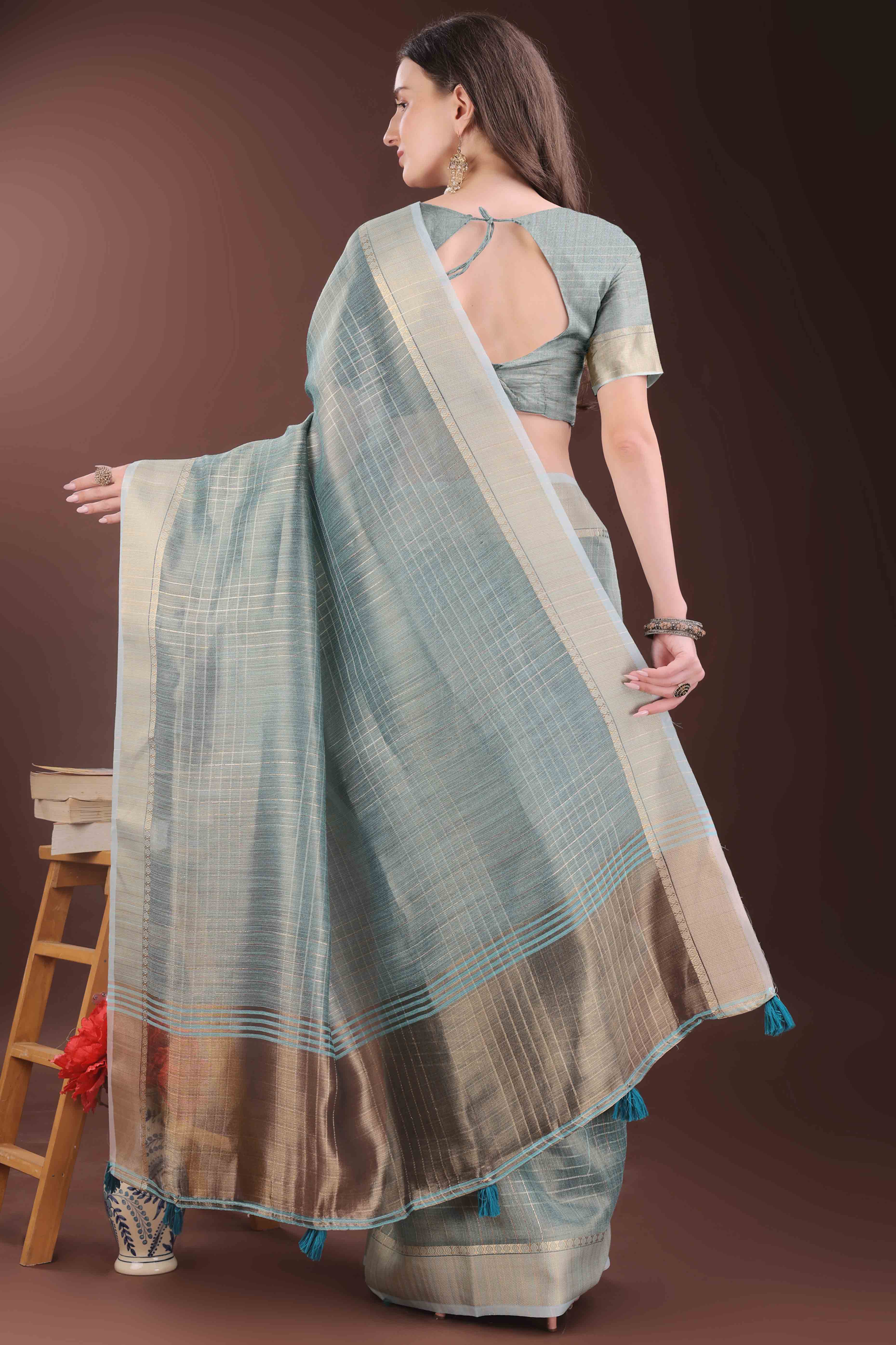Blue Organza Saree With Zari Weaving Check Patterns & Elegant Tassel Accents