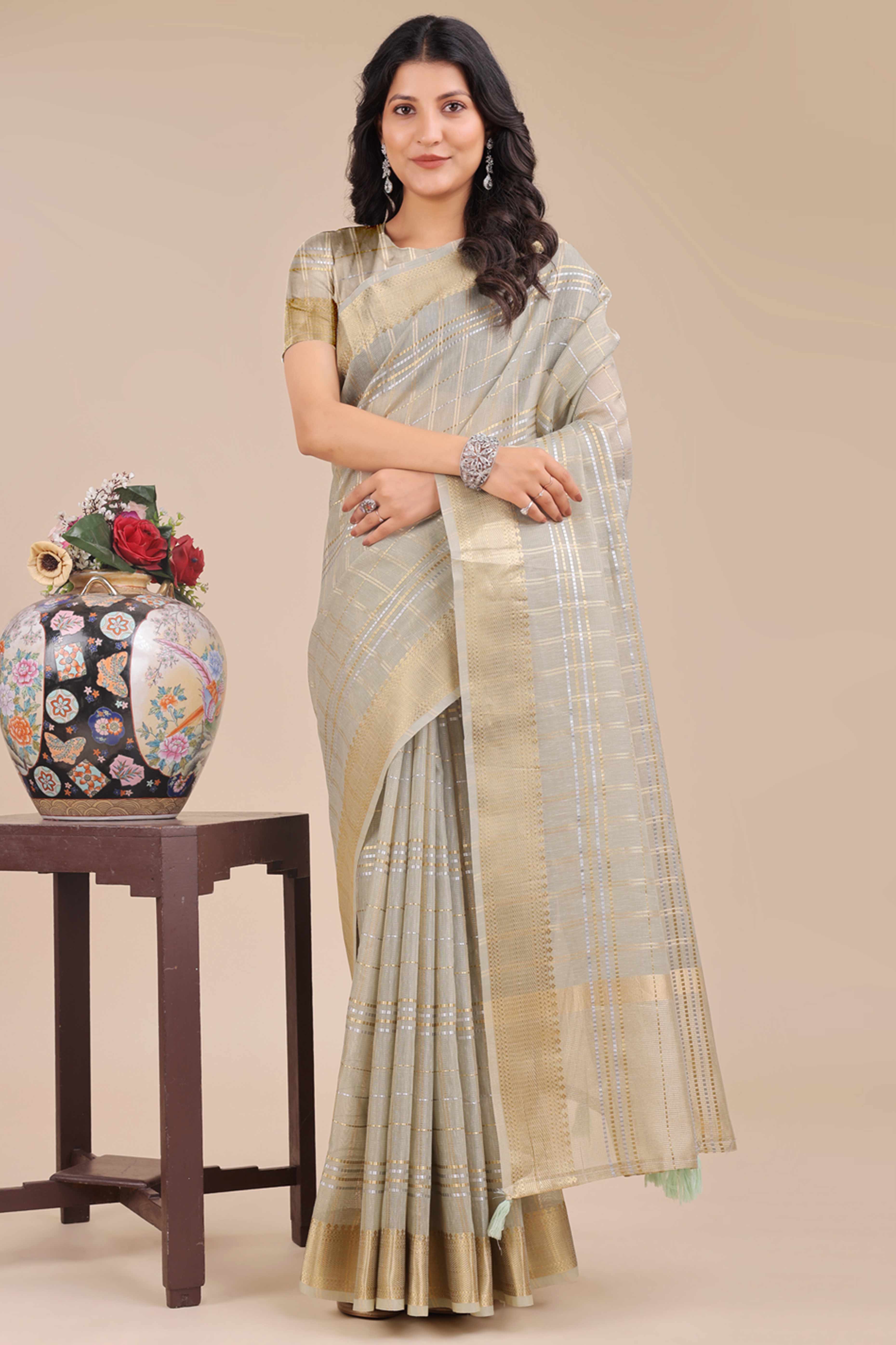 Sea Green Organza Saree with Checkered Zari Weaving and Tassel Detailing
