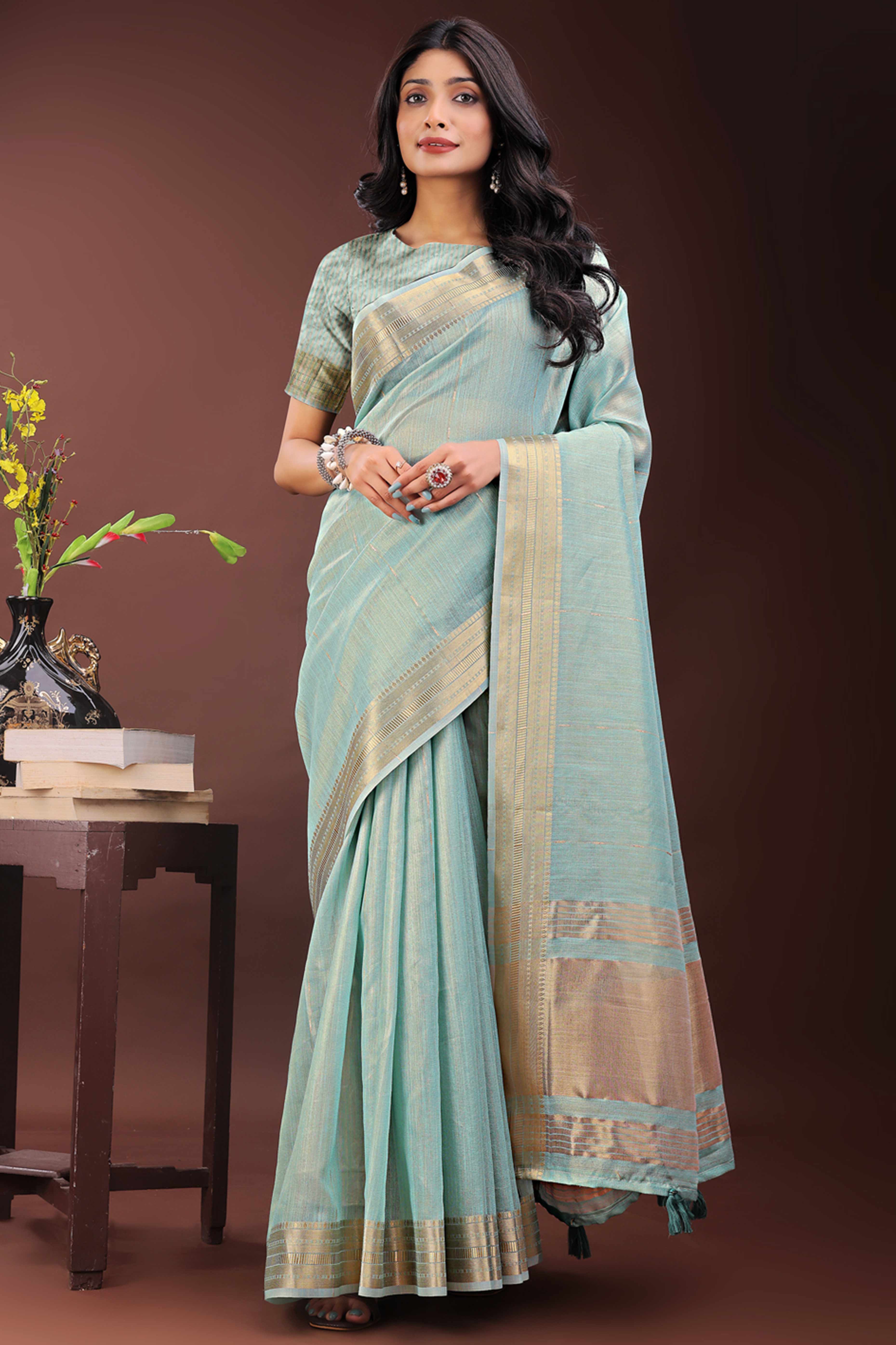 Blue Organza Saree Adorned With Zari Weave & Tassel Edges