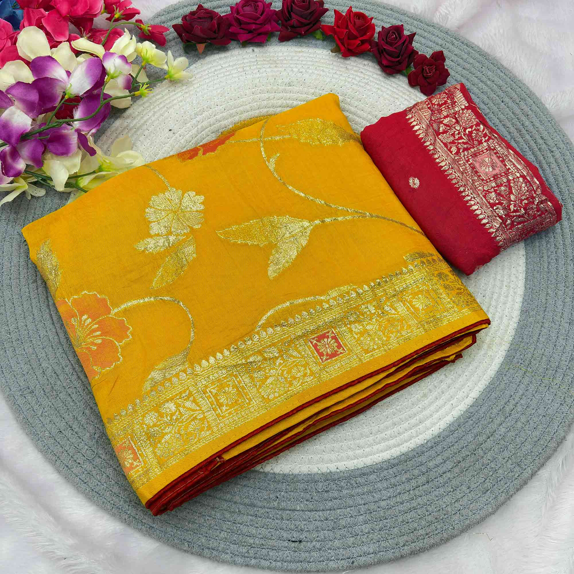 Yellow Graceful Soft Muslin Saree Highlighted with Premium Meenakari Zari Work