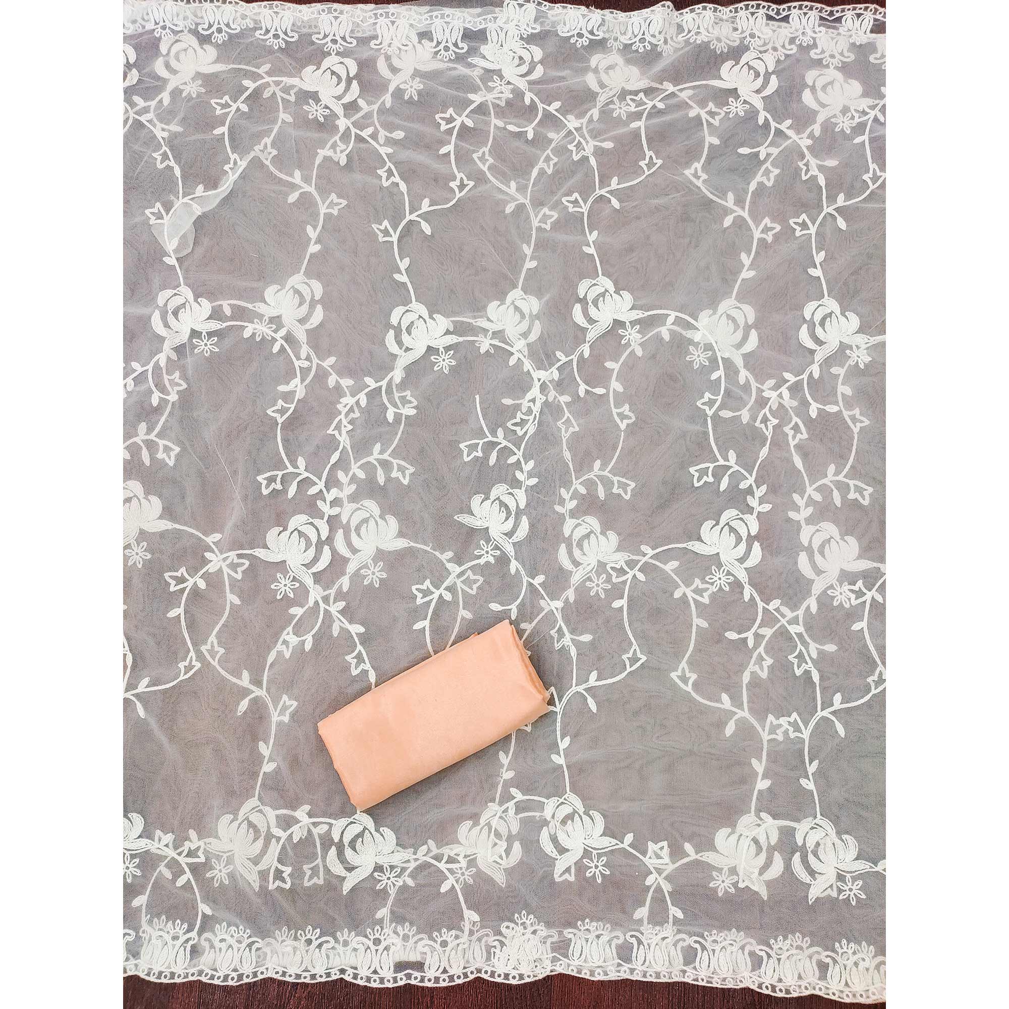 Light Orange Unstitched Dress Material Featuring Fine Floral Embroidery on Chanderi Silk