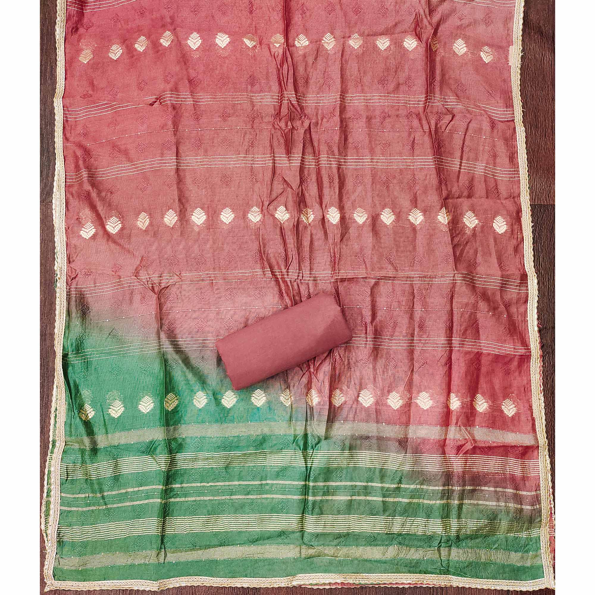 Peach Suit Material in Cotton Blend with Beautifully Embroidered Floral Patterns