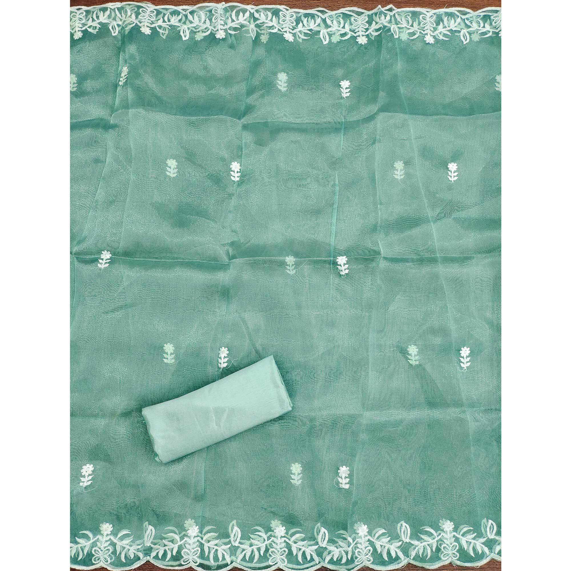 Lightweight Sea Green Organza Unstitched Suit Material with Intricate Floral Work