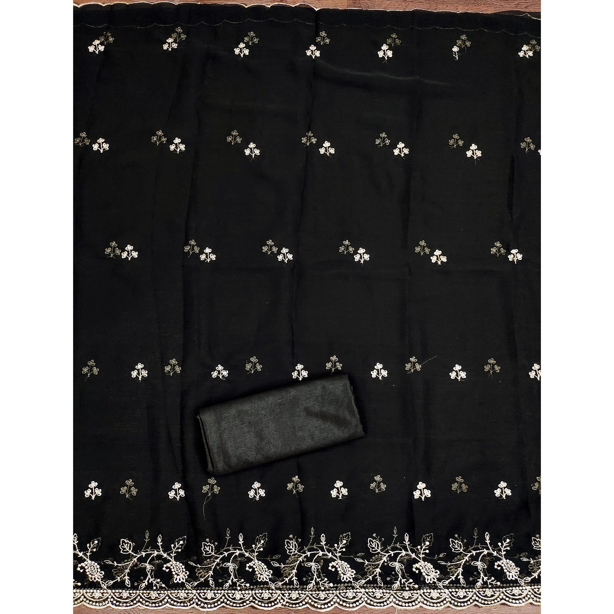 White & Black Georgette Dress Material Showcasing Elegant Floral Thread Embroidery Work