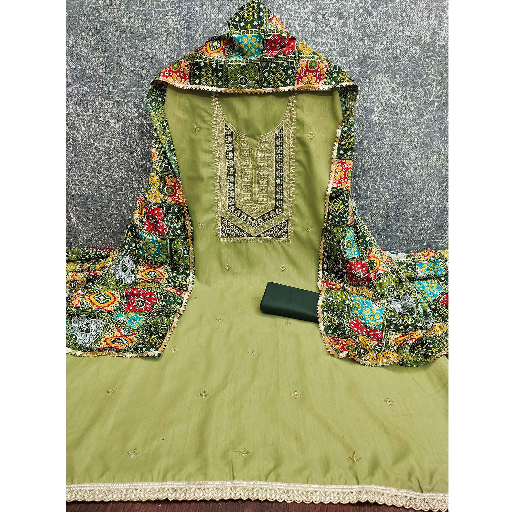 Stylish Green Cotton Blend Dress Material Enriched With Floral Embroidery & Sequins Work