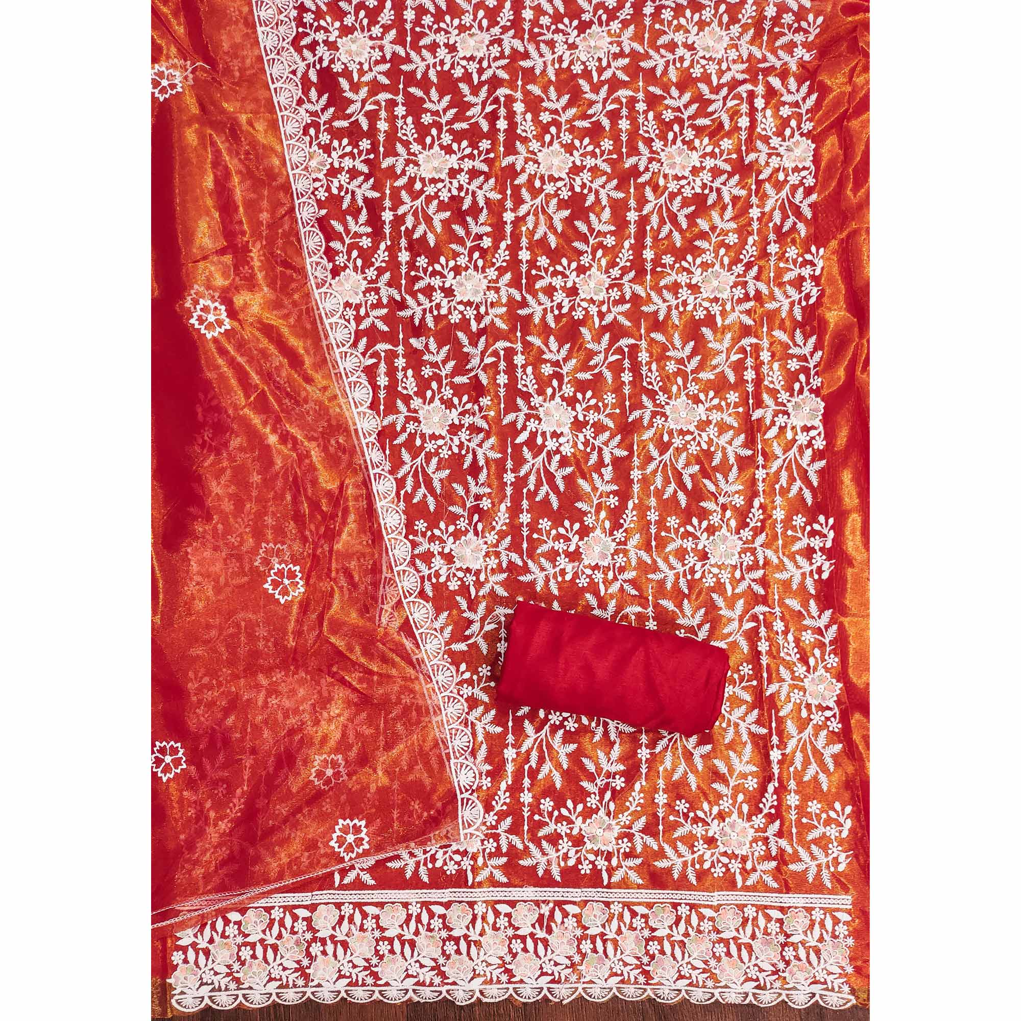 Stunning Rust Dress Material Adorned with Intricate Floral Embroidery