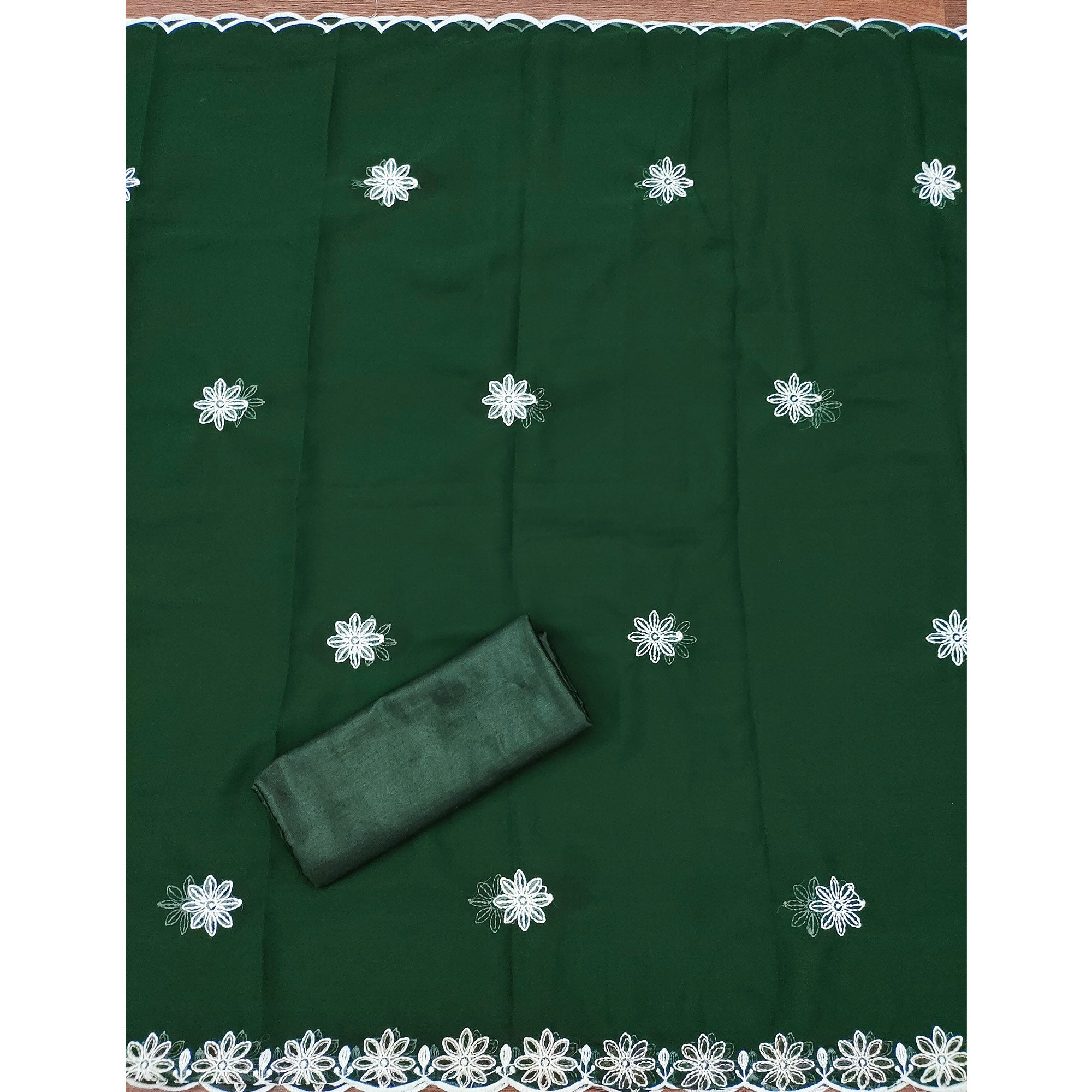 Green Georgette Dress Material Highlighted With Paisley & Floral Thread Embroidery