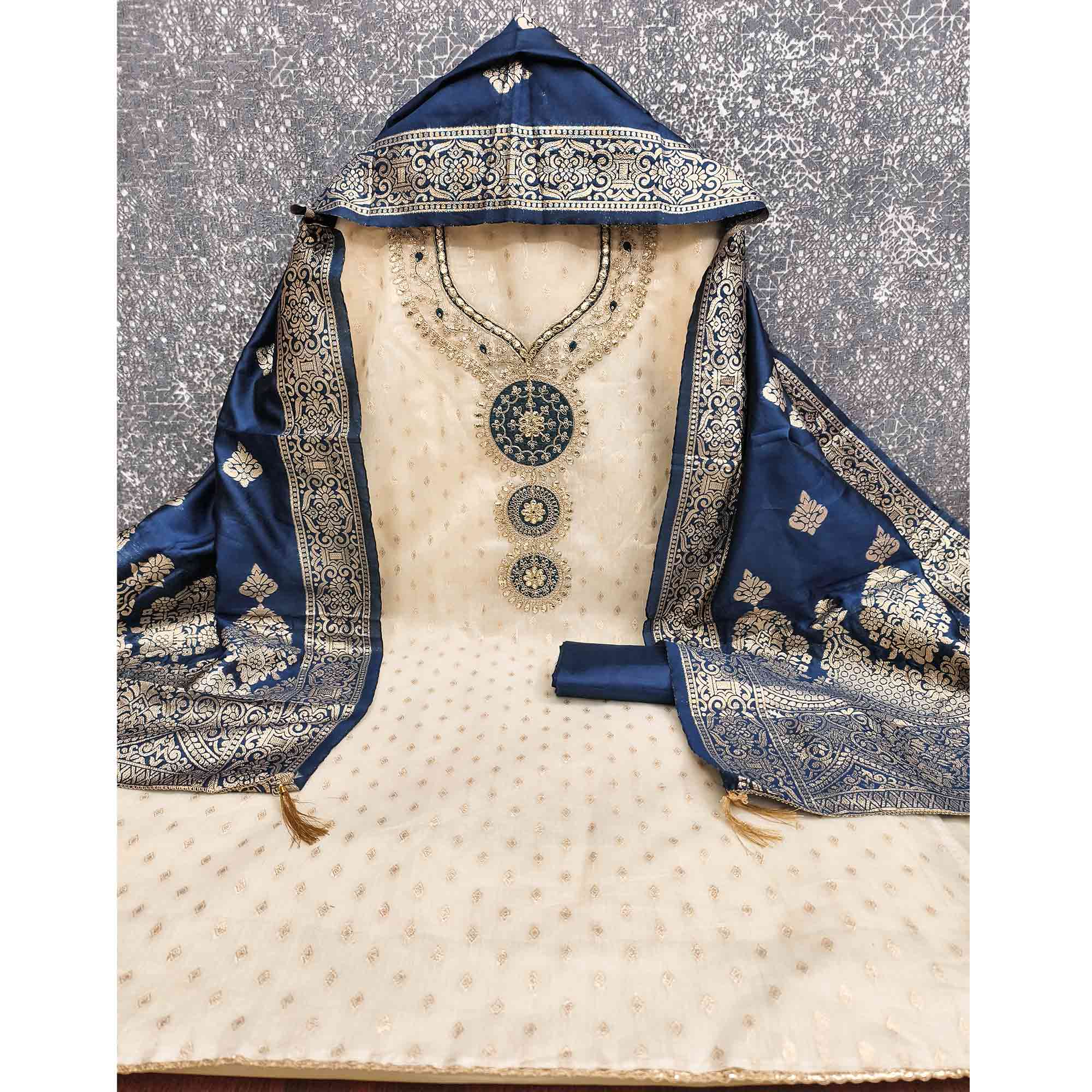 Cream & Blue Shimmer Dress Material Featuring Intricate Zari Weaving With Cording Embroidery