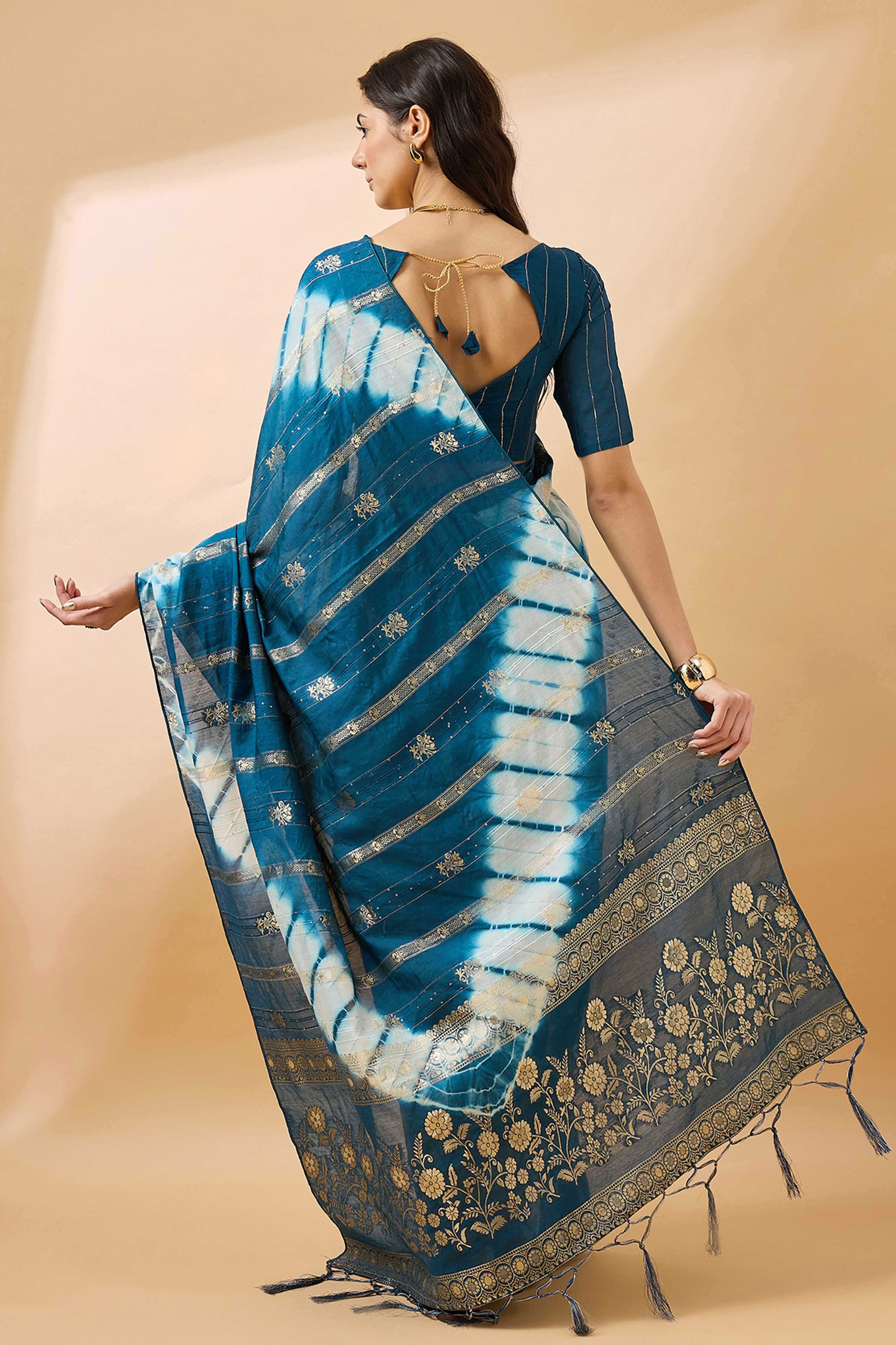 Blue Floral Woven Staple Cotton Blend Saree Highlighted With Sequins Embroidery & Tasselled Pallu