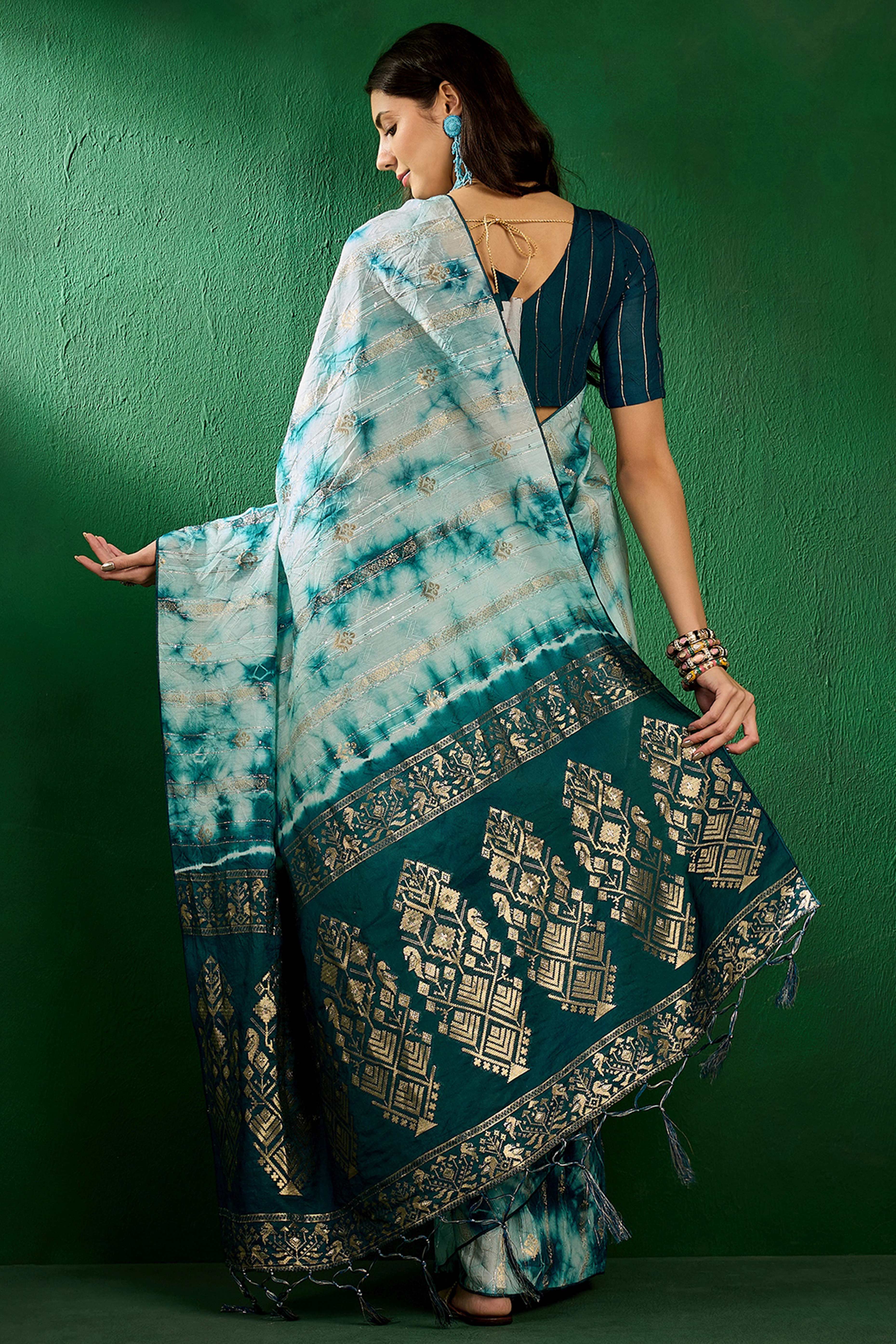 Floral Zari Woven Teal Saree In Cotton Blend With Sparkling Sequins & Elegant Tassel Pallu