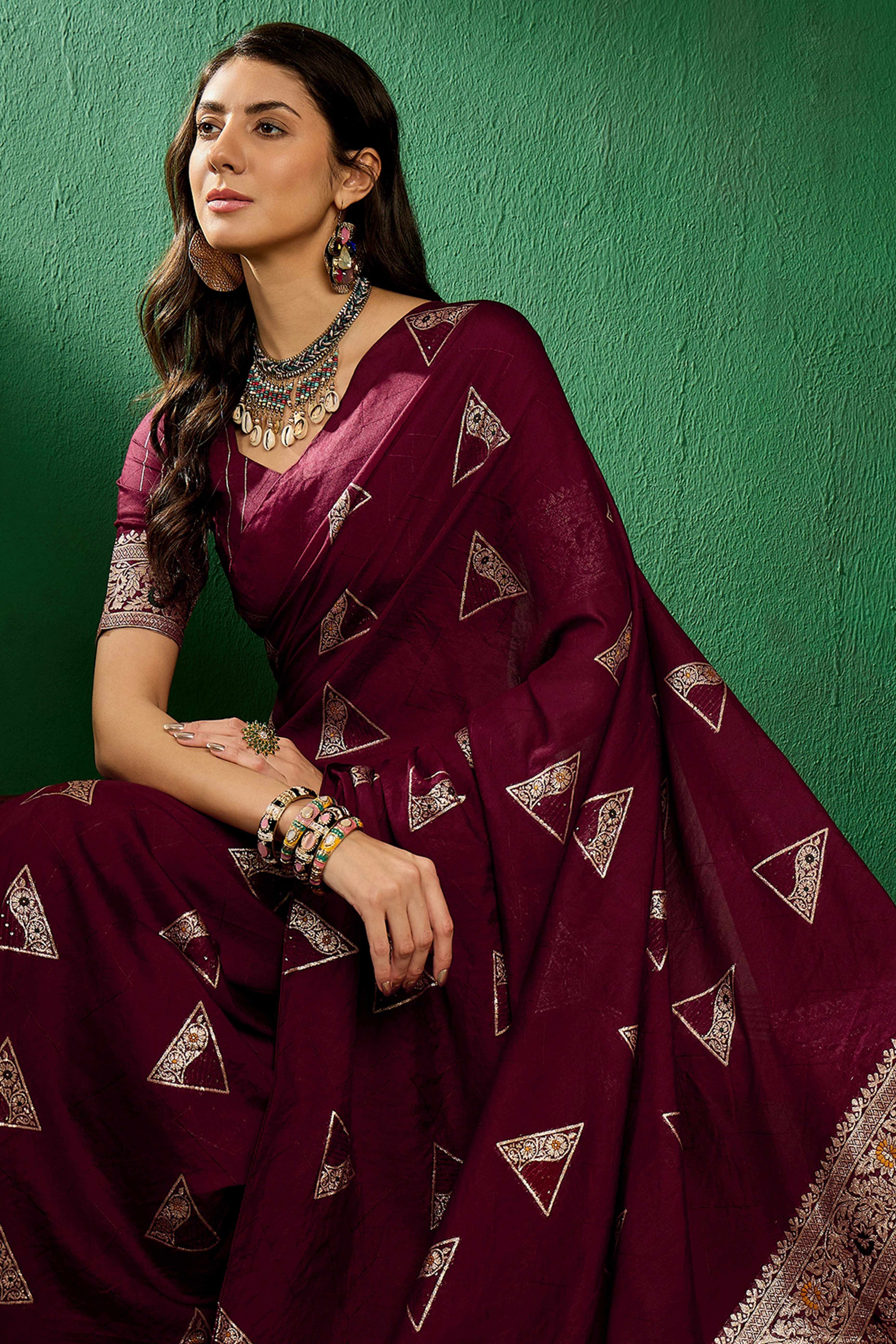 Wine Floral Woven Staple Cotton Blend Saree With Sparkling Sequin Embroidery & Graceful Tassel Pallu