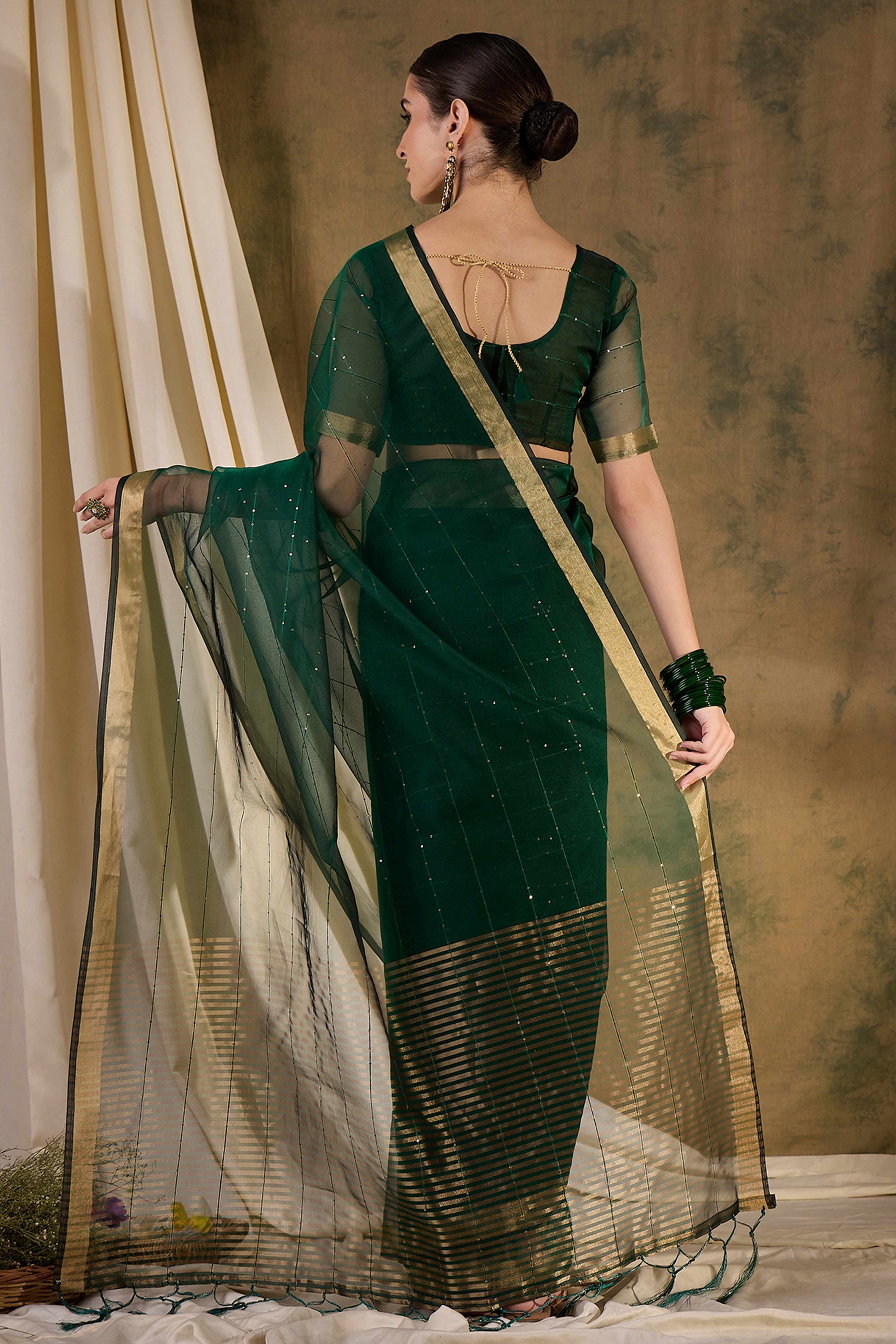 Green Organza Silk Saree Featuring Shimmering Sequins Embroidery & Elegant Tasselled Pallu
