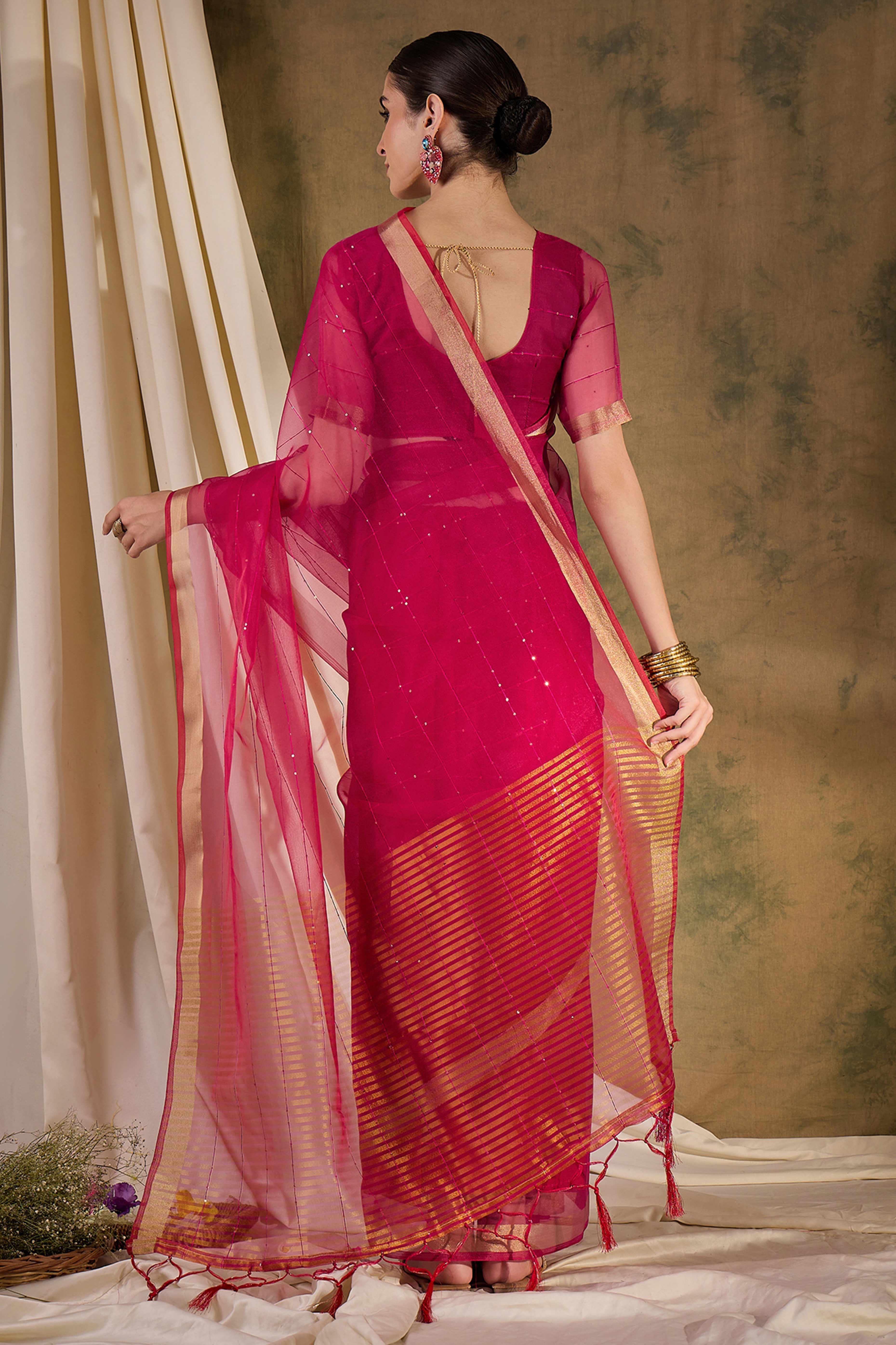 Pink Organza Silk Saree Featuring Shimmering Sequins Embroidery & Elegant Tasselled Pallu