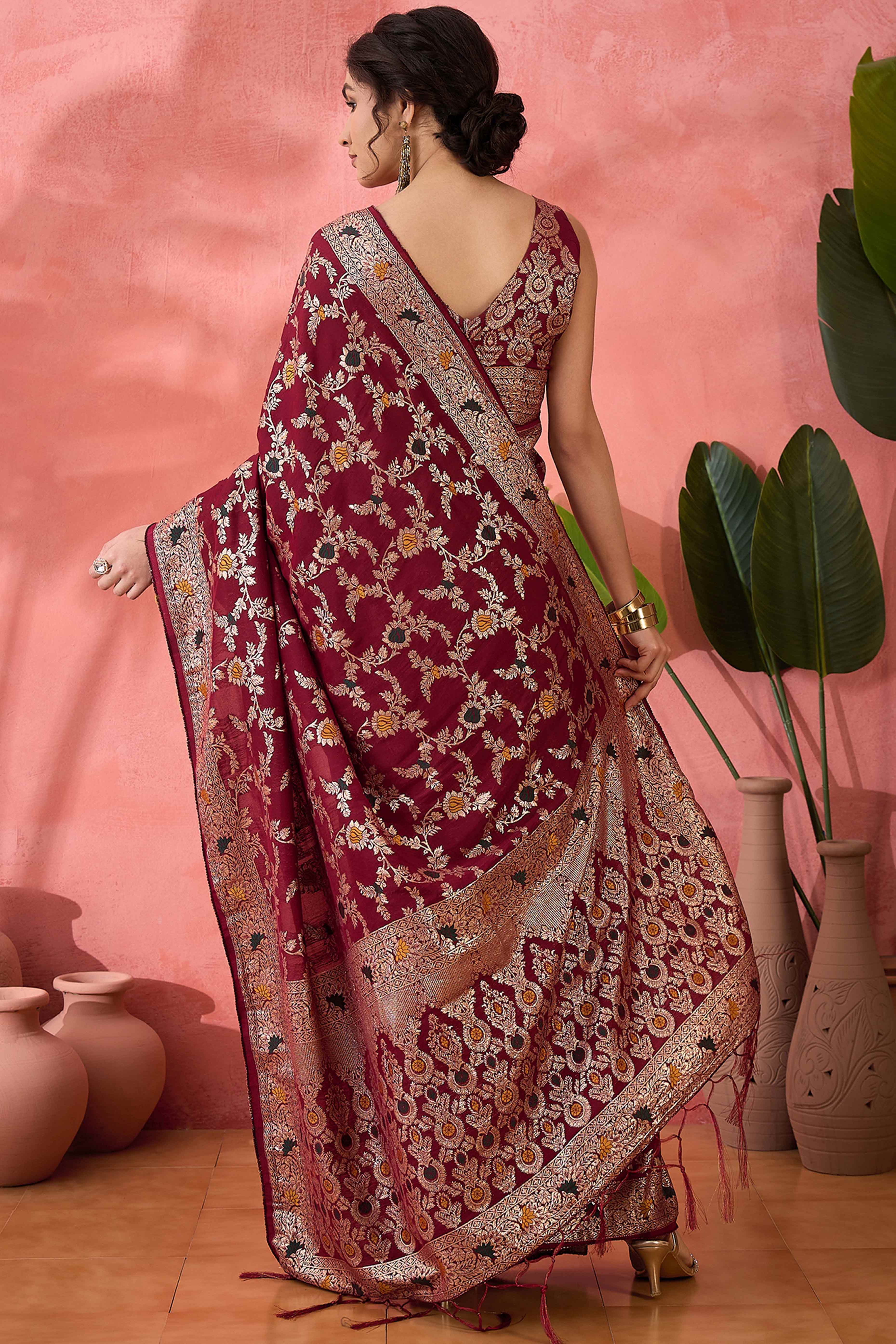 Maroon Cotton Meena jacquard Saree Featuring Intricate Floral Weaving & Tassels On The Pallu