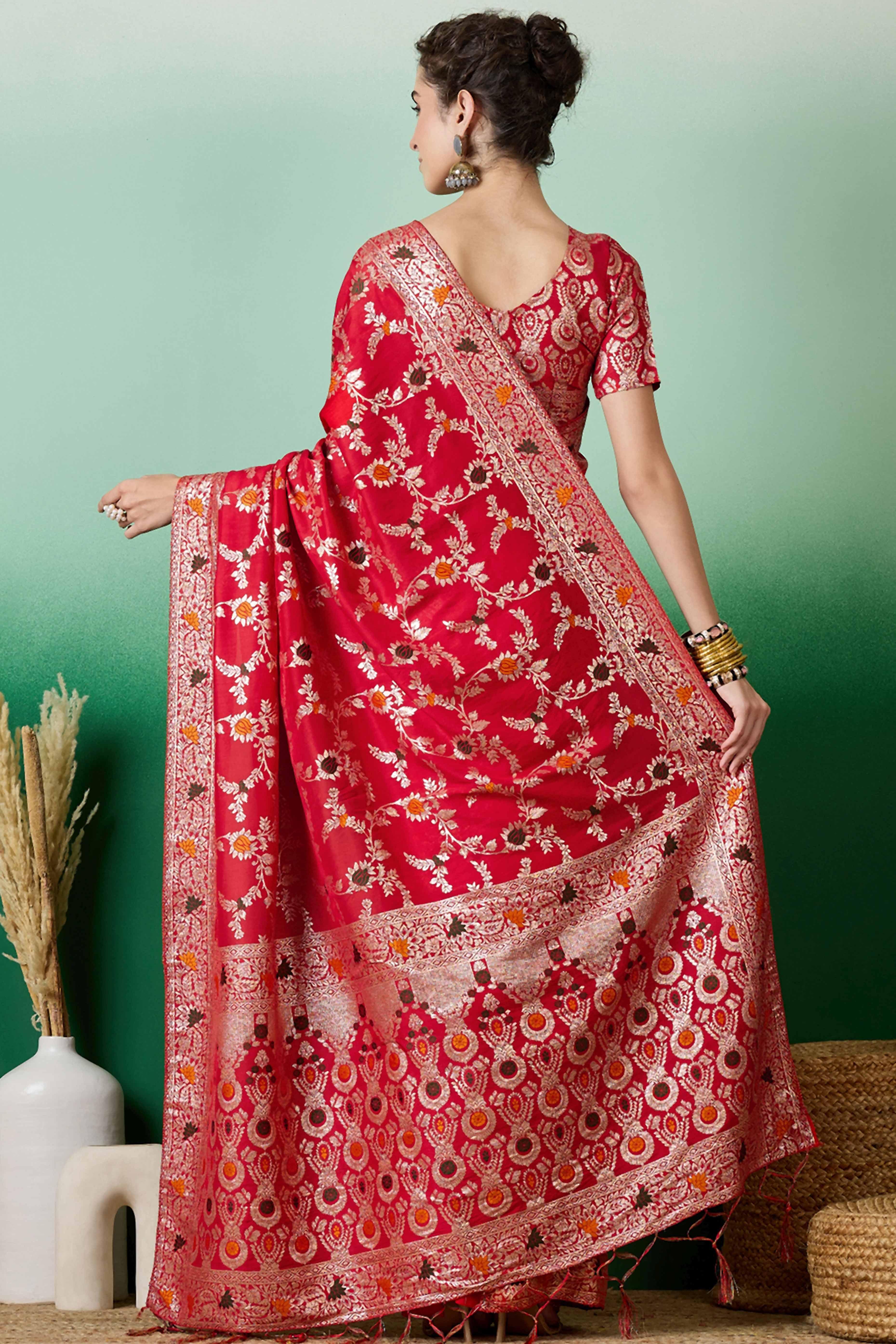 Red Cotton Meena jacquard Saree Featuring Intricate Floral Weaving & Playful Tassels On The Pallu
