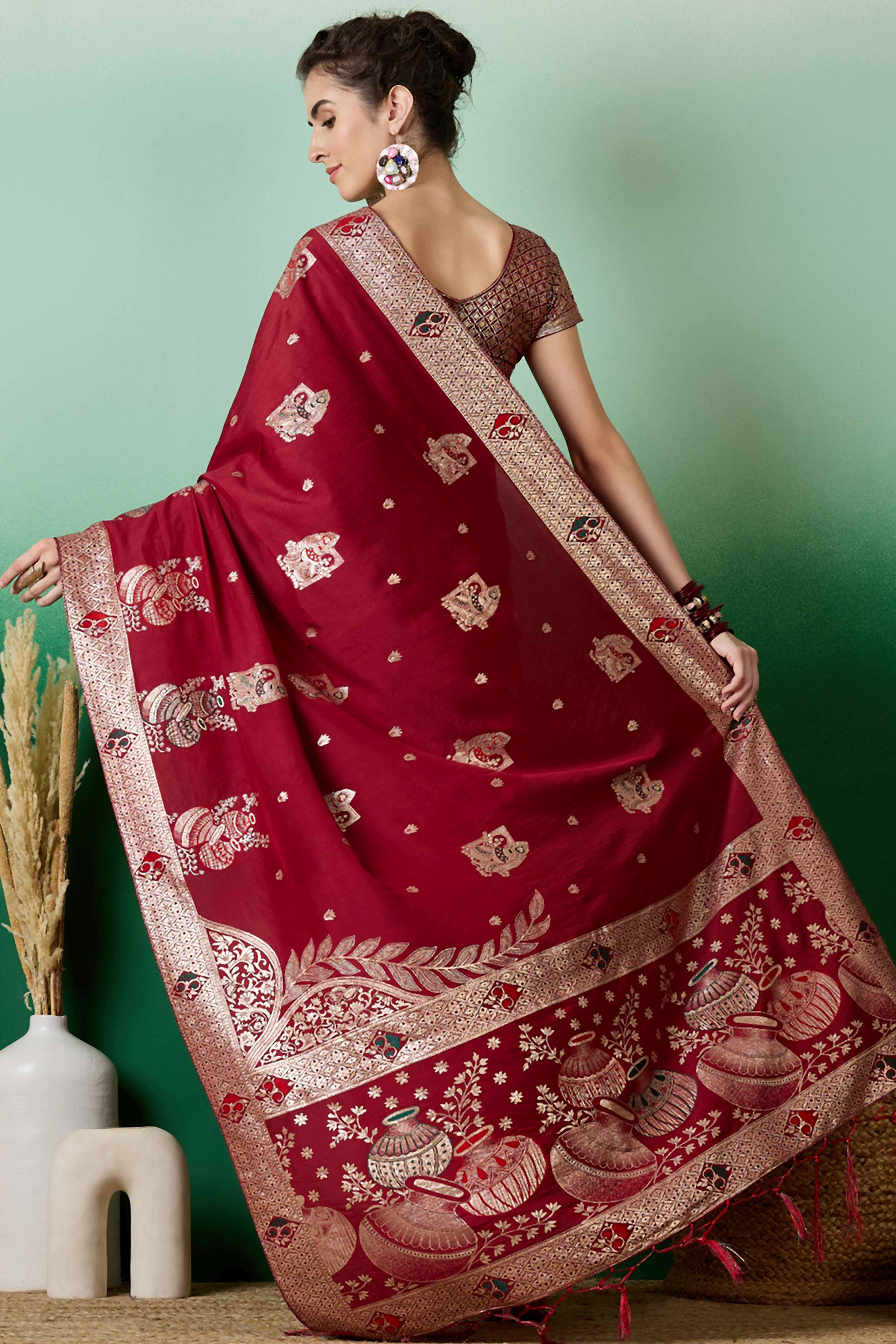 Maroon Cotton Blend Saree Adorned With Floral Zari Weaving & Soft Tassel Accents