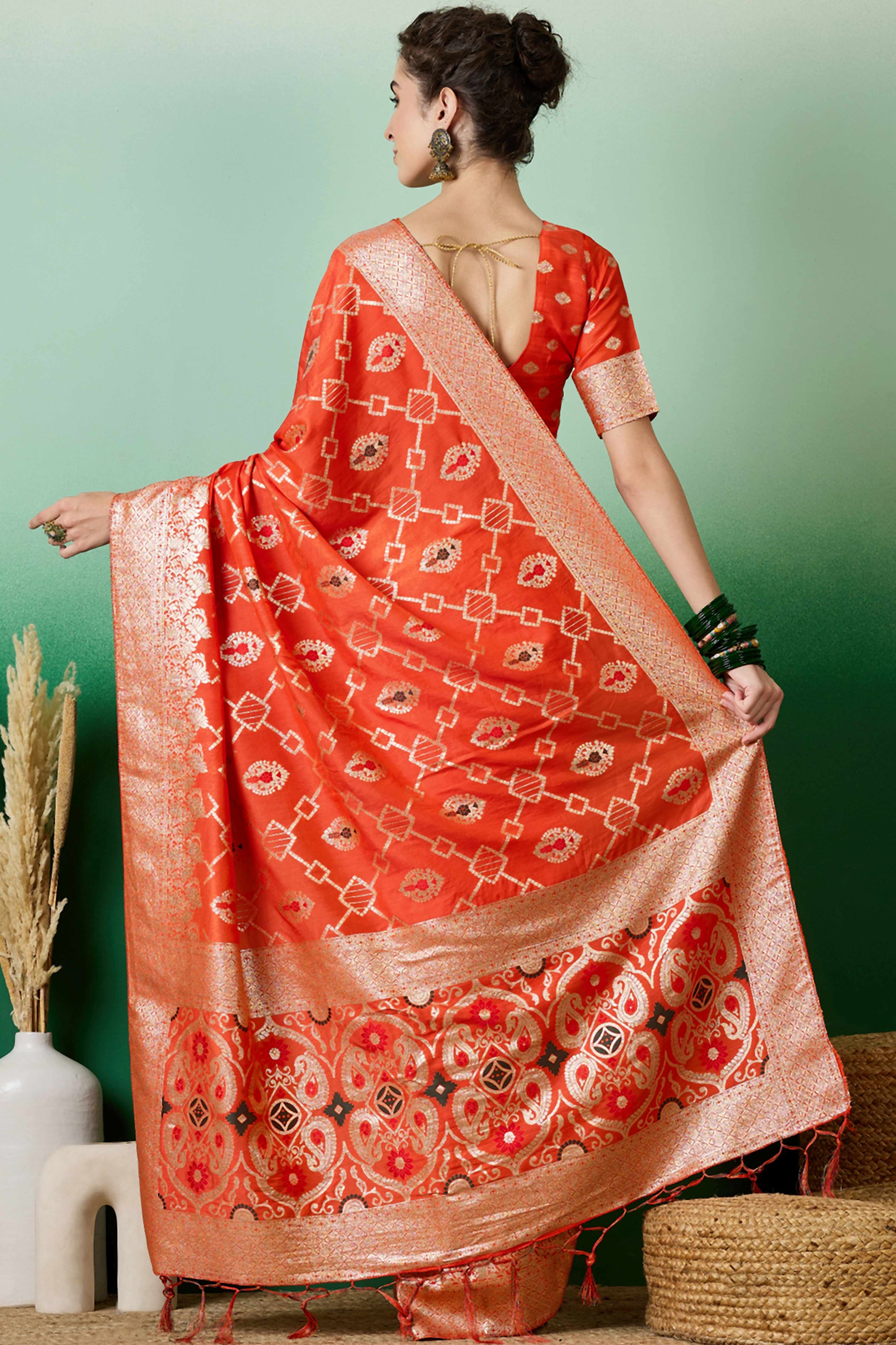 Orange Zari Woven Staple Cotton Blend Saree With Floral Motifs & Tassel Detailed Pallu