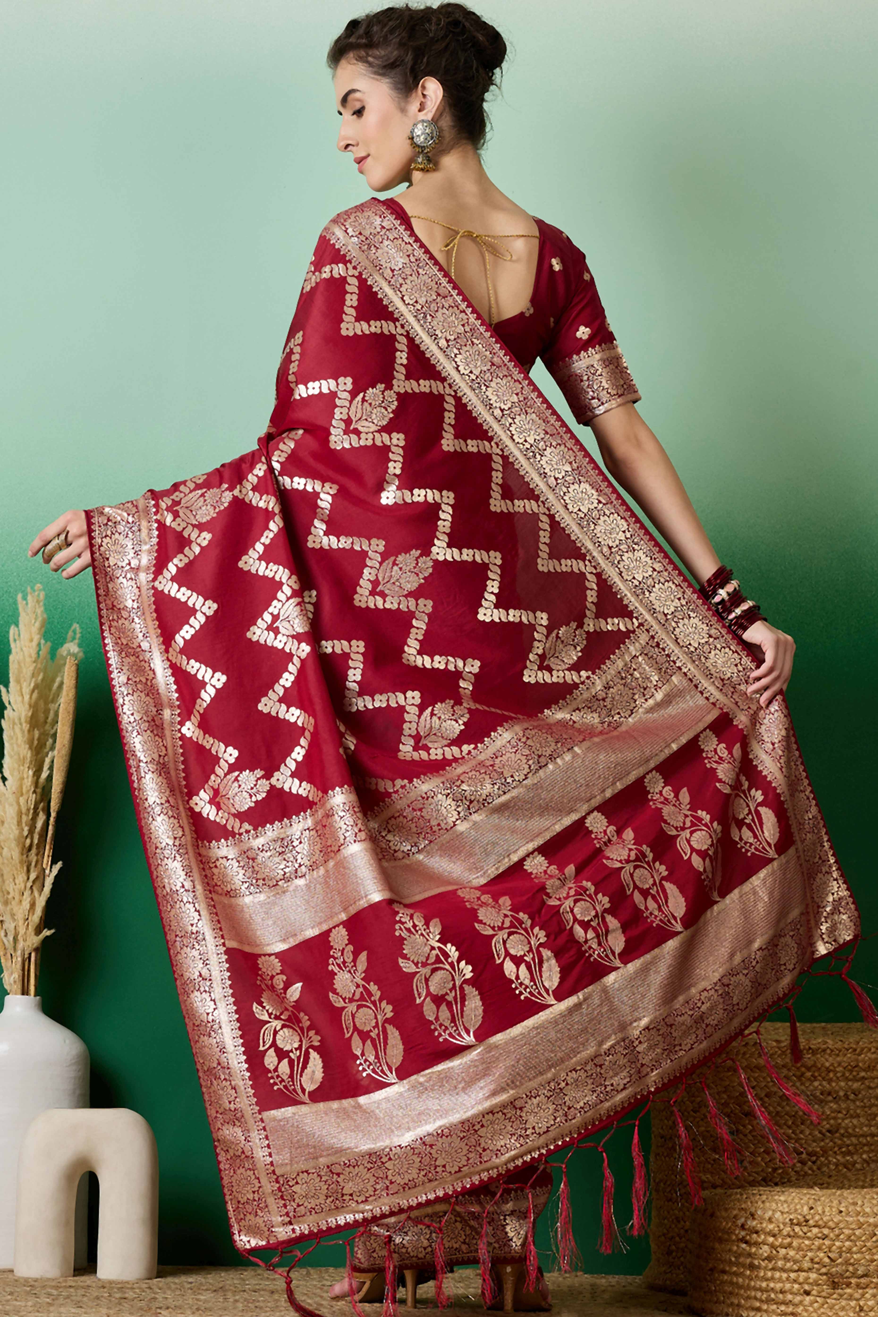 Maroon Cotton Blend Jacquard Saree Adorned With Floral Weaving & Graceful Tassel Pallu