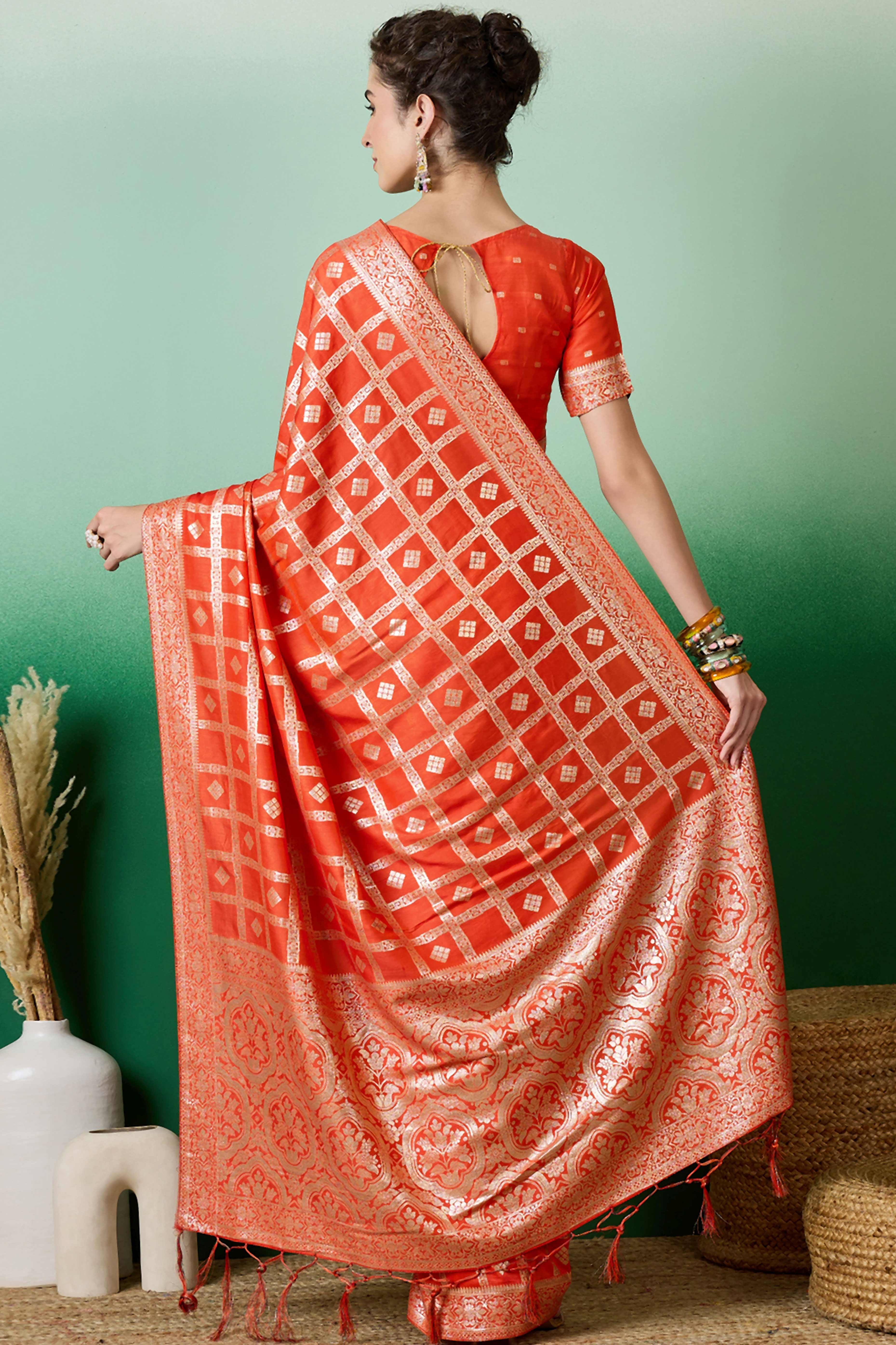Orange Jacquard Saree In Cotton Blend Featuring Elegant Floral Weaving & A Tasselled Pallu