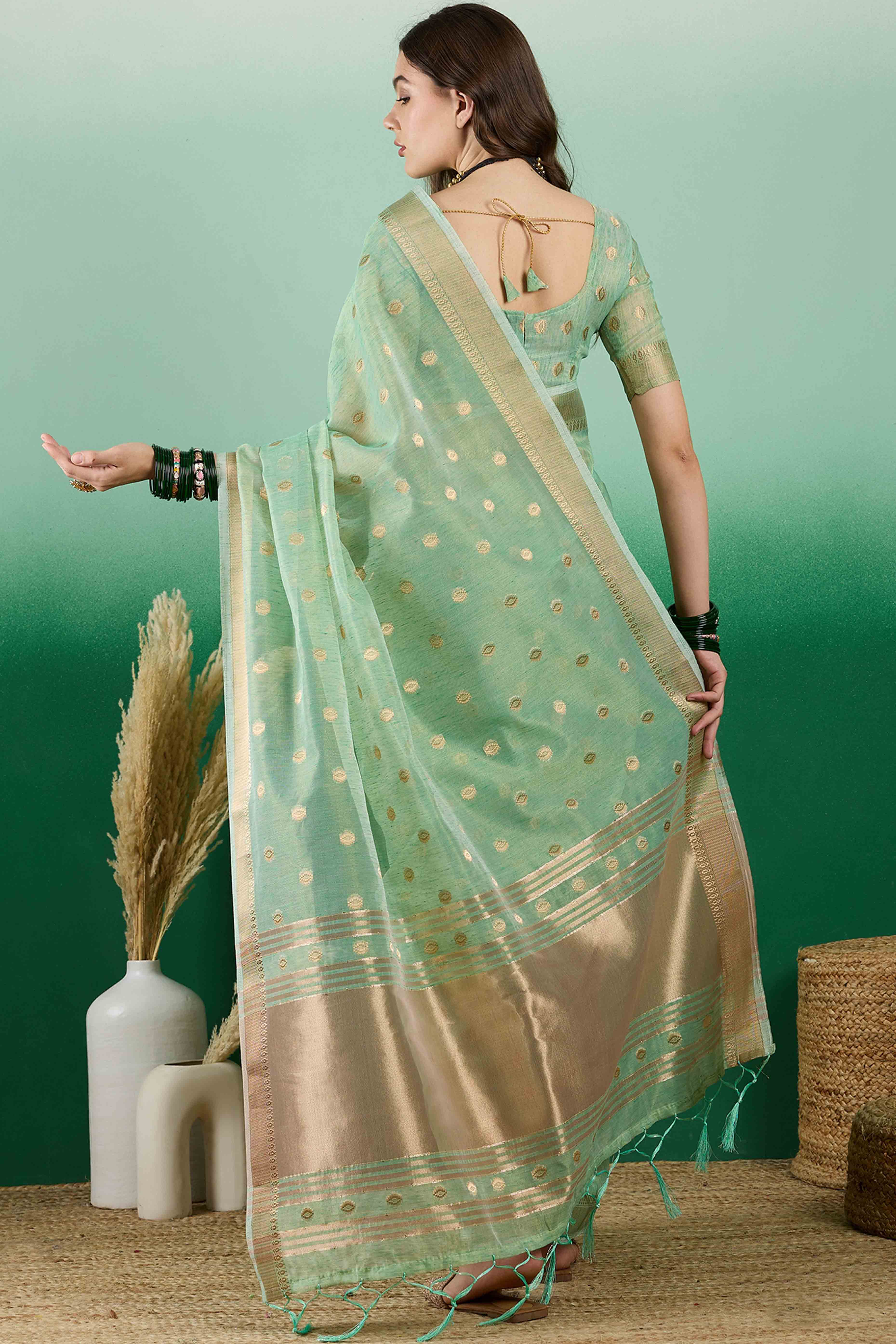 Green Khadi Organza Saree Embellished With Traditional Zari Work & Tassels