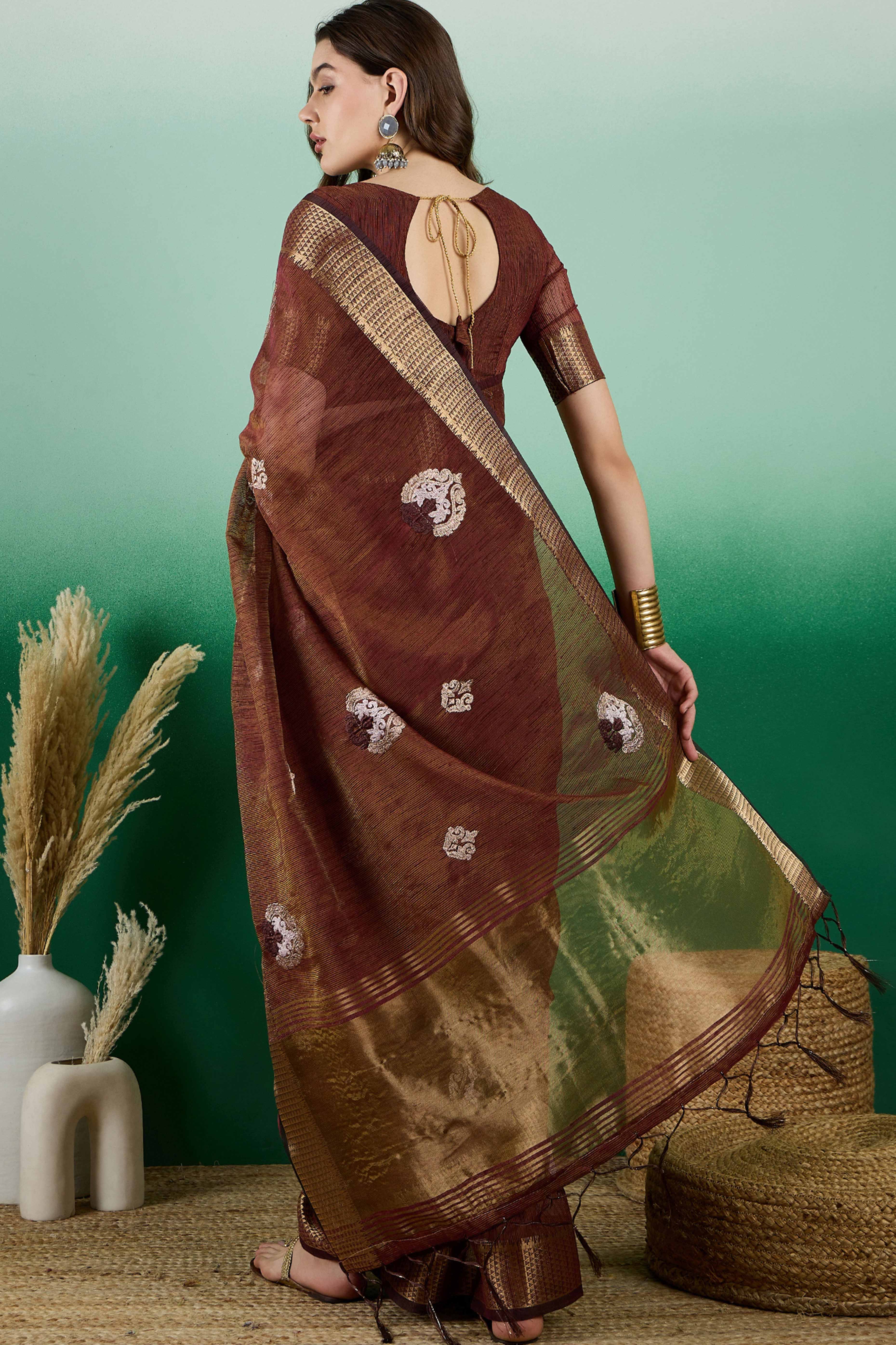 Brown Khadi Organza Saree Adorned With Elegant Embroidery & Tassel Pallu