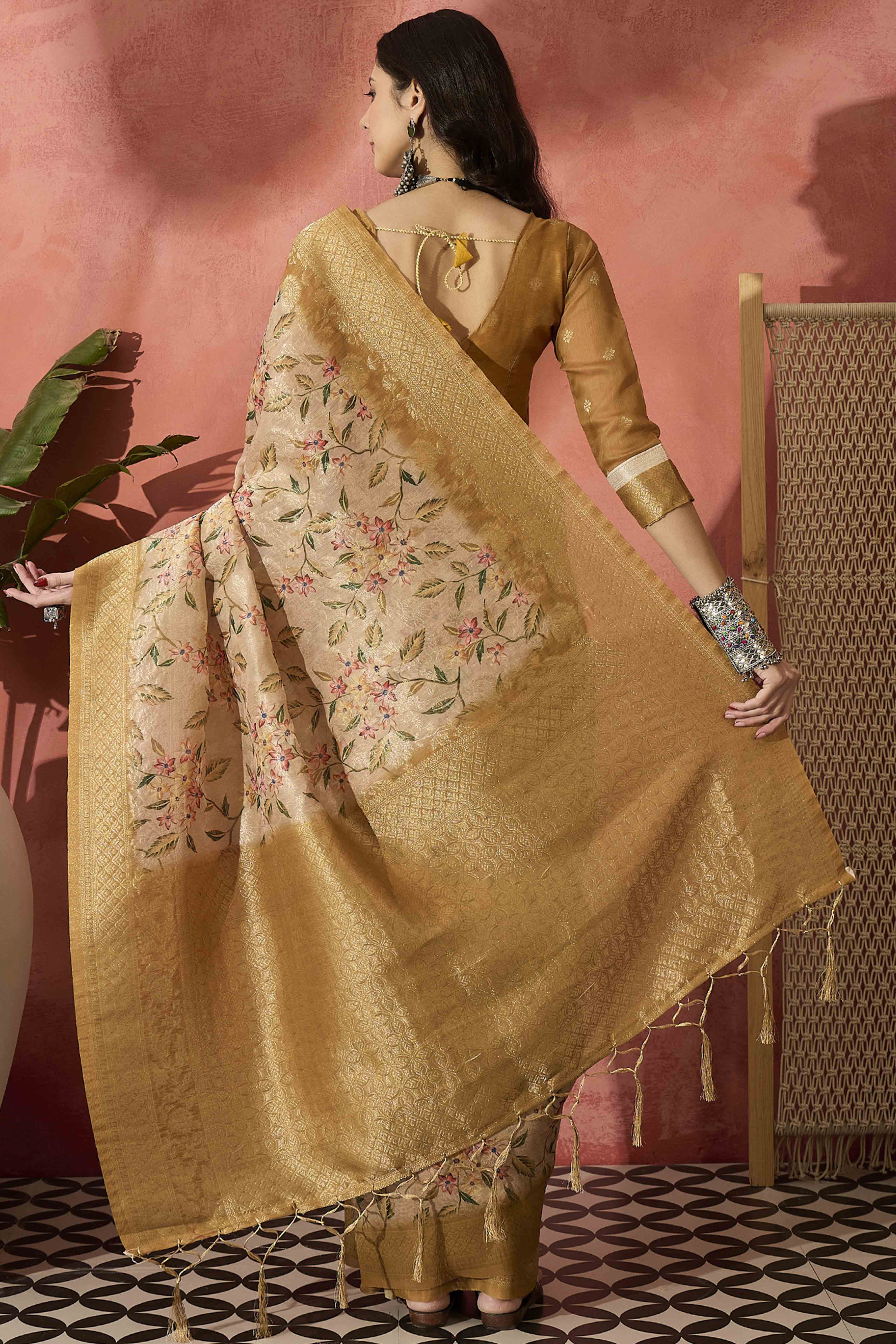 Cream Saree In Poly Cotton Featuring Intricate Floral Zari Weaving & Tassel Accents