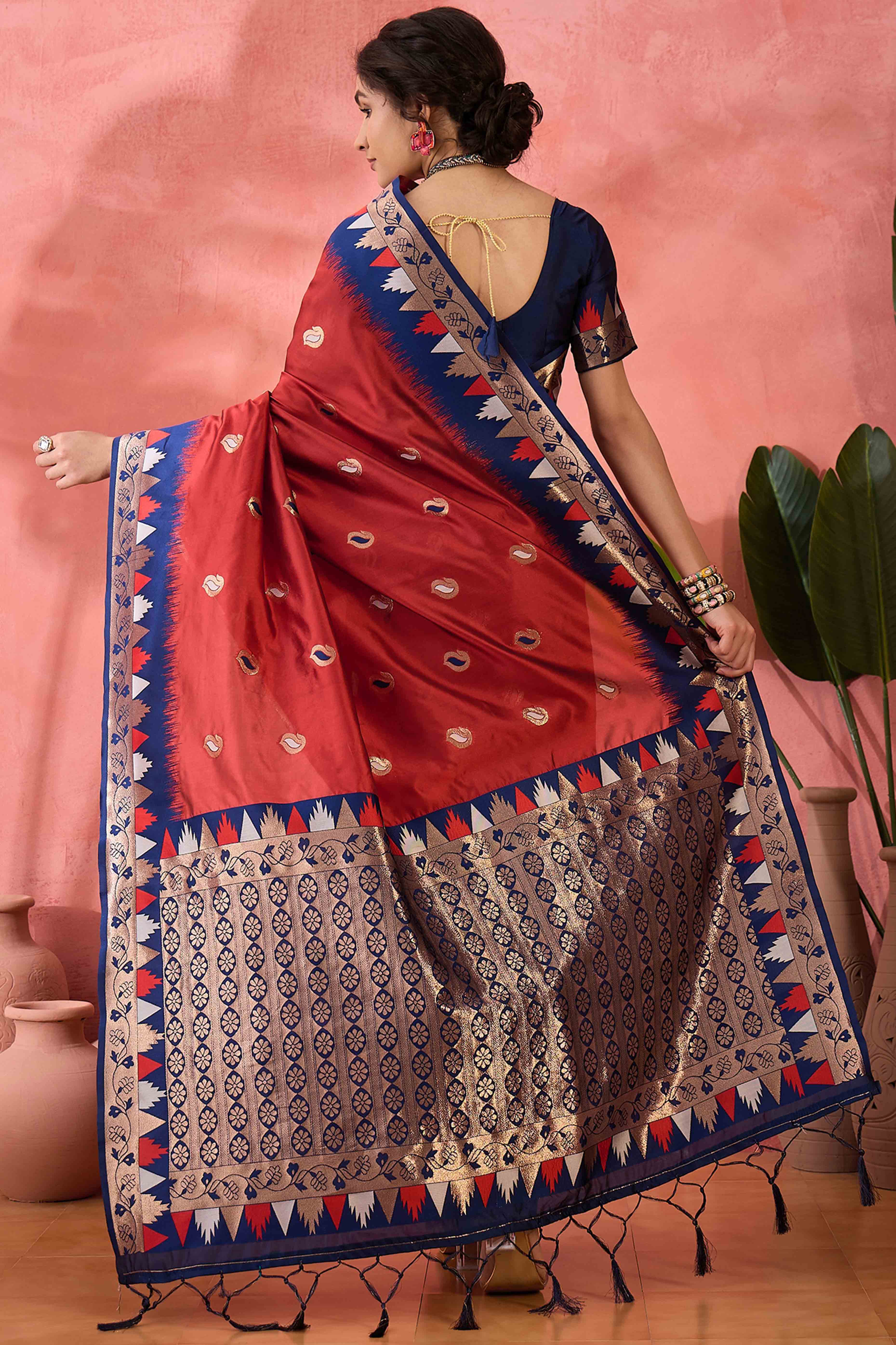 Maroon Zari Woven Poly Silk Saree Enhanced With Graceful Tassel Detailing