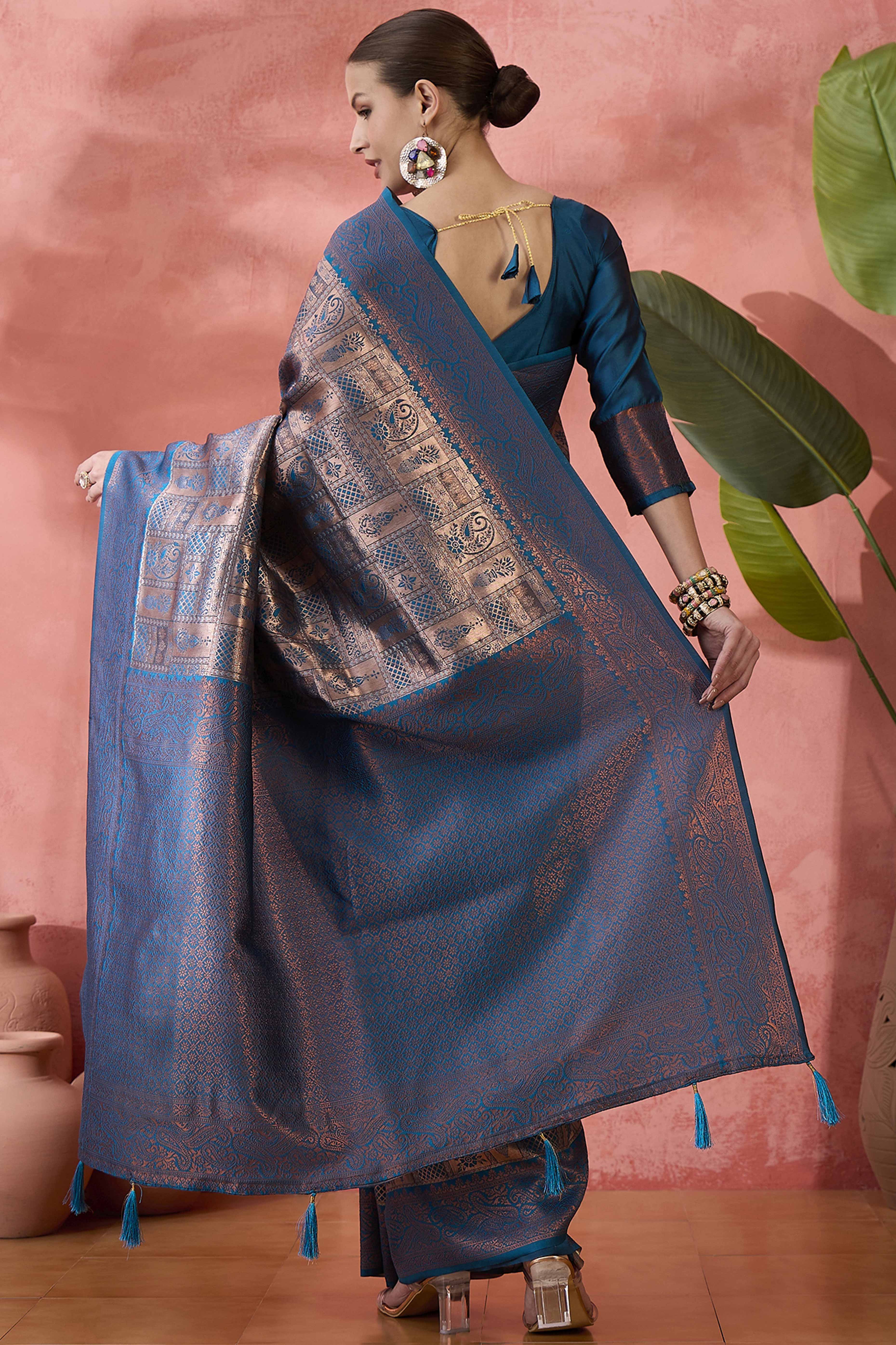 Blue Woven Poly Silk Blend Saree Featuring Floral & Paisley Motifs With Tassel Accents