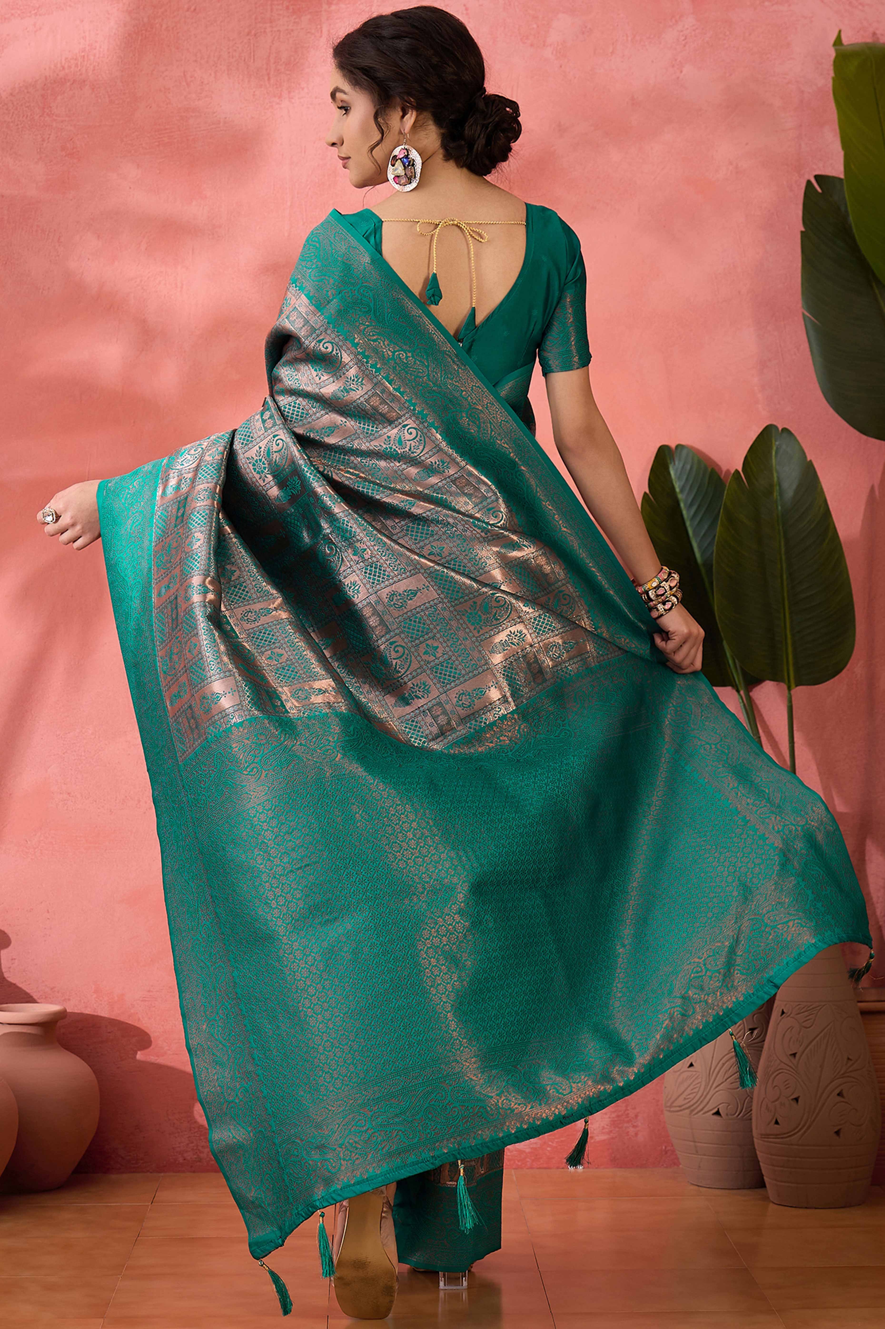 Rama Green Woven Poly Silk Blend Saree Featuring Floral & Paisley Motifs With Tassel Accents
