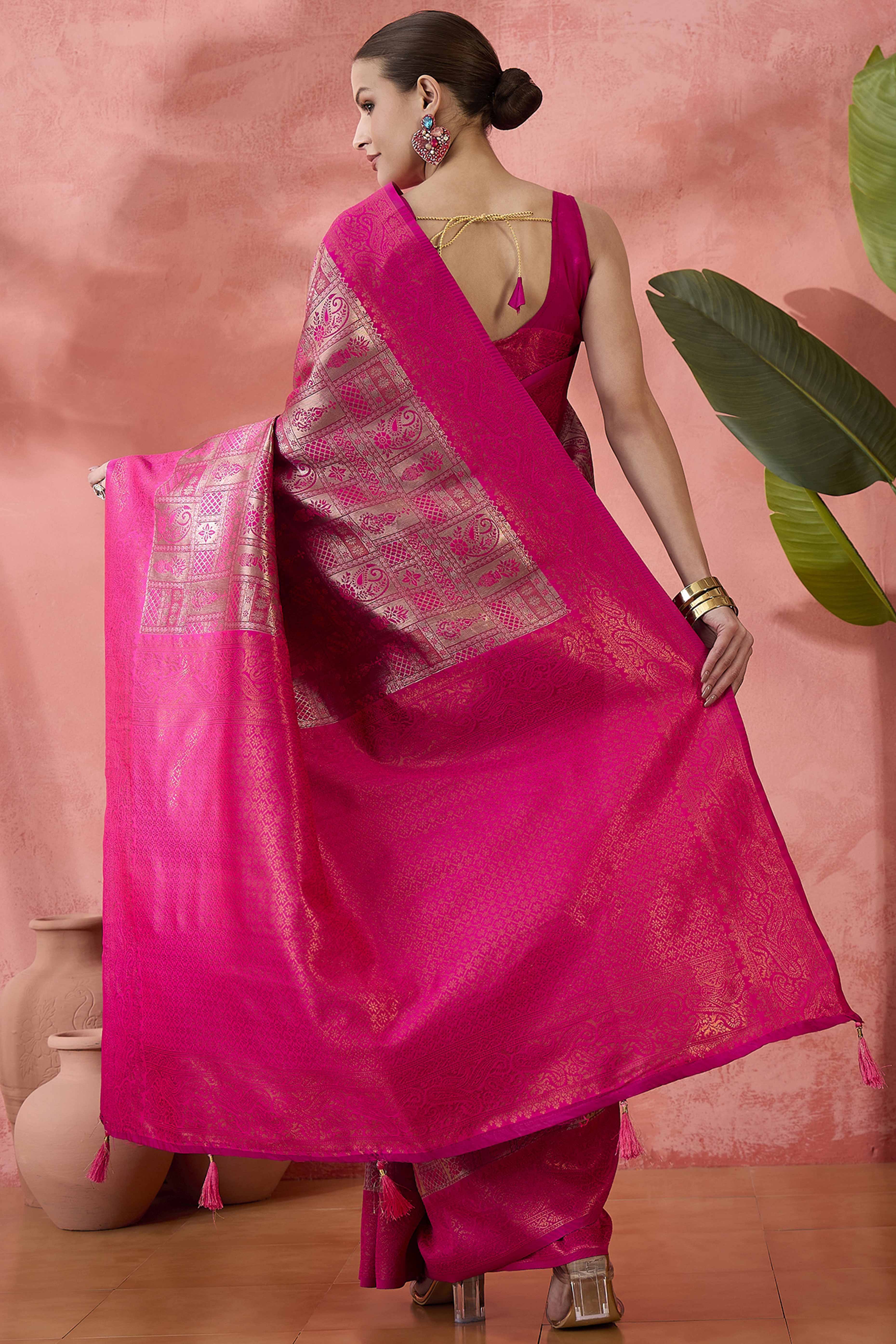 Rani Pink Woven Poly Silk Blend Saree Featuring Floral & Paisley Motifs With Tassel Accents