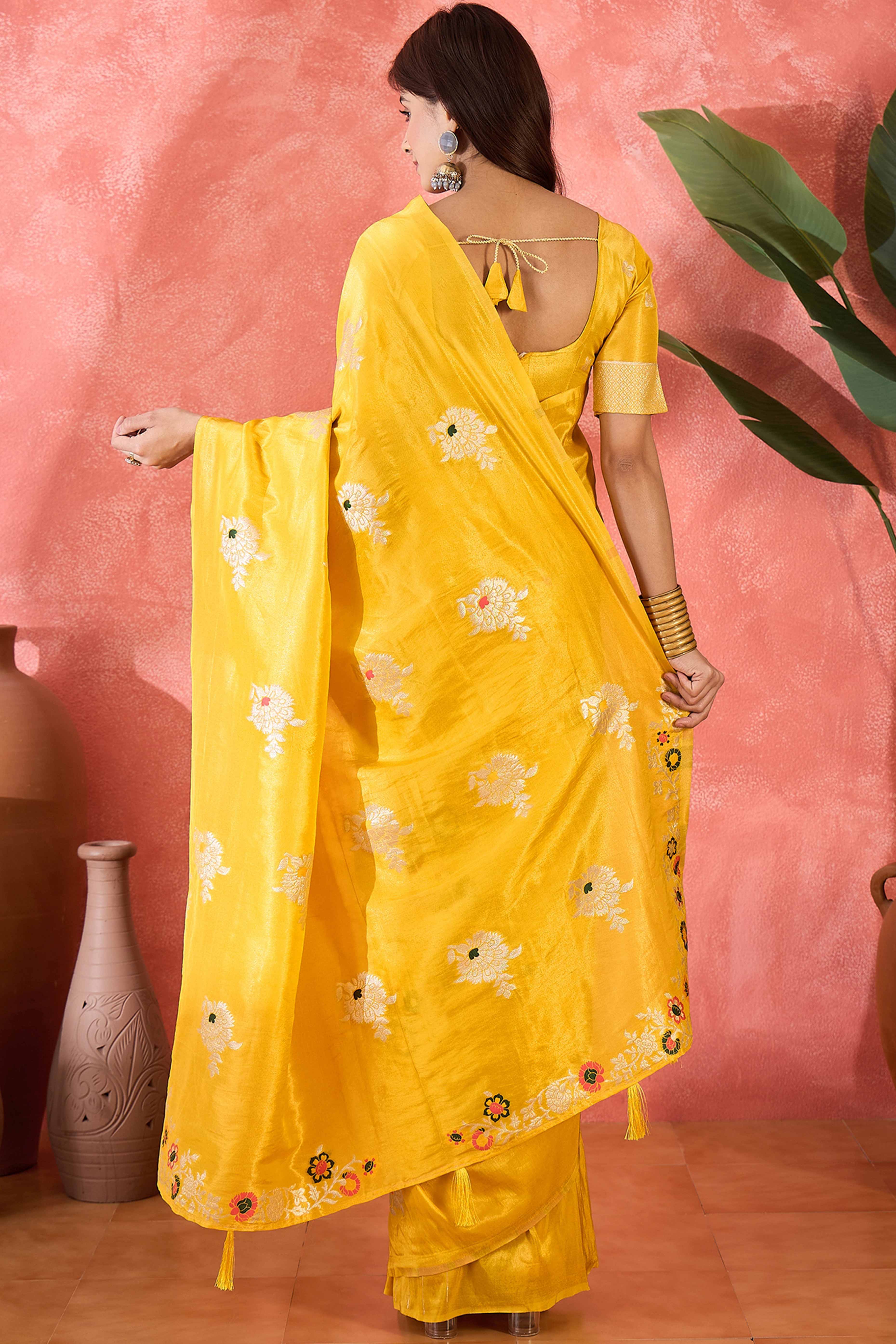 Yellow Shimmer Saree Featuring Intricate Floral Zari Weaving & Tassel Finish