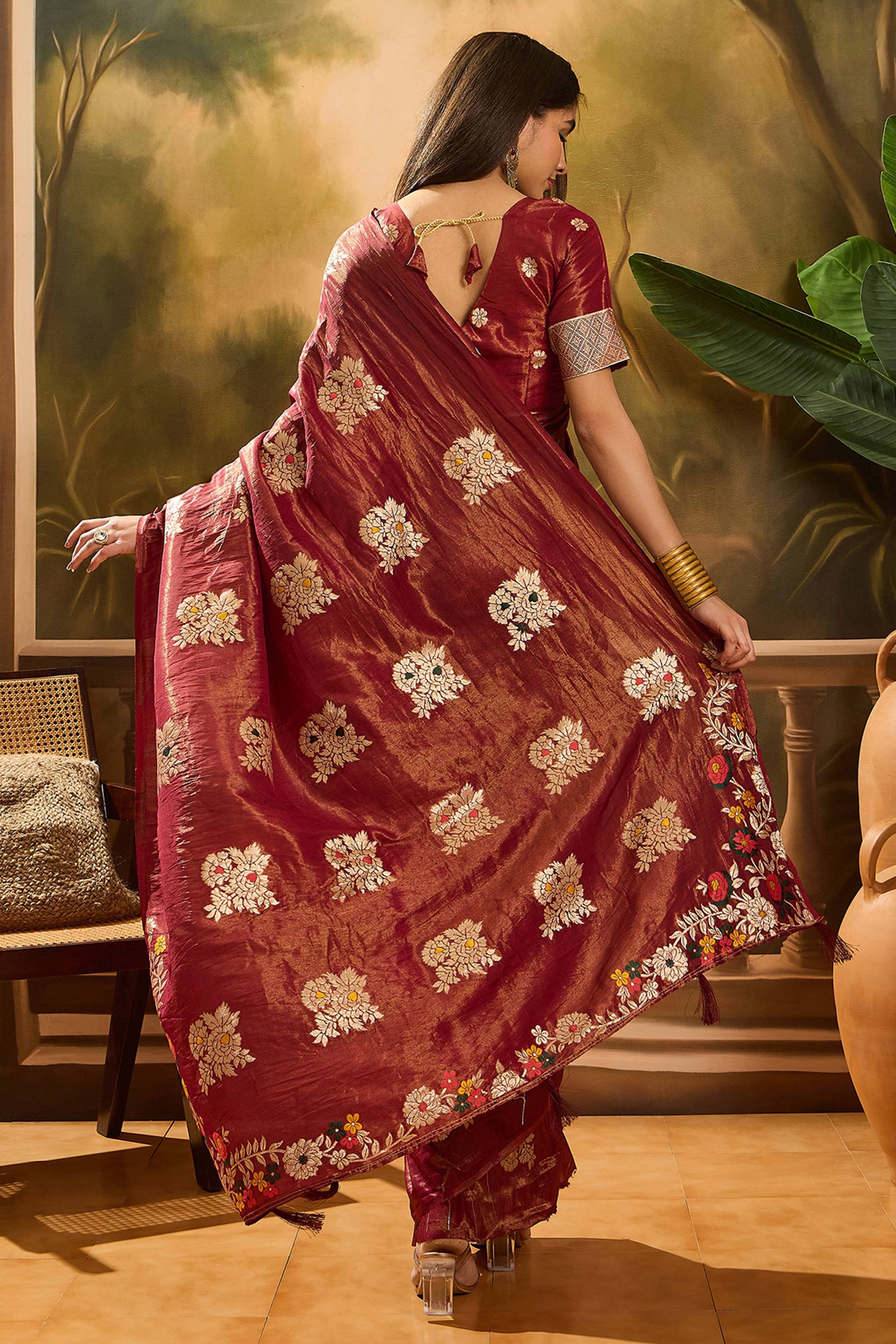 Maroon Saree In Shimmer Fabric With Floral Zari Weaving & Decorative Tassel Pallu