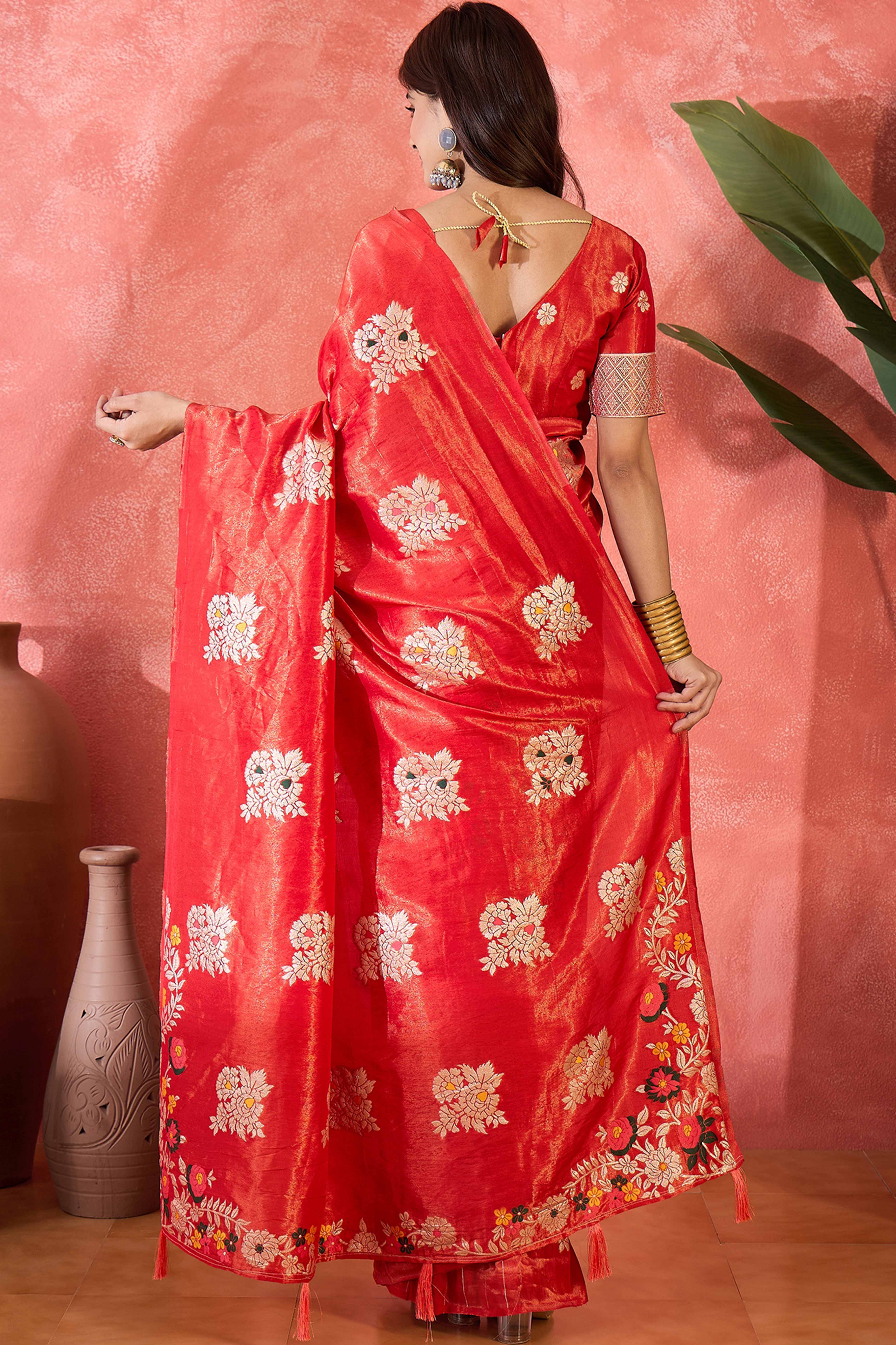 Red Saree In Shimmer Fabric With Floral Zari Weaving & Decorative Tassel Pallu