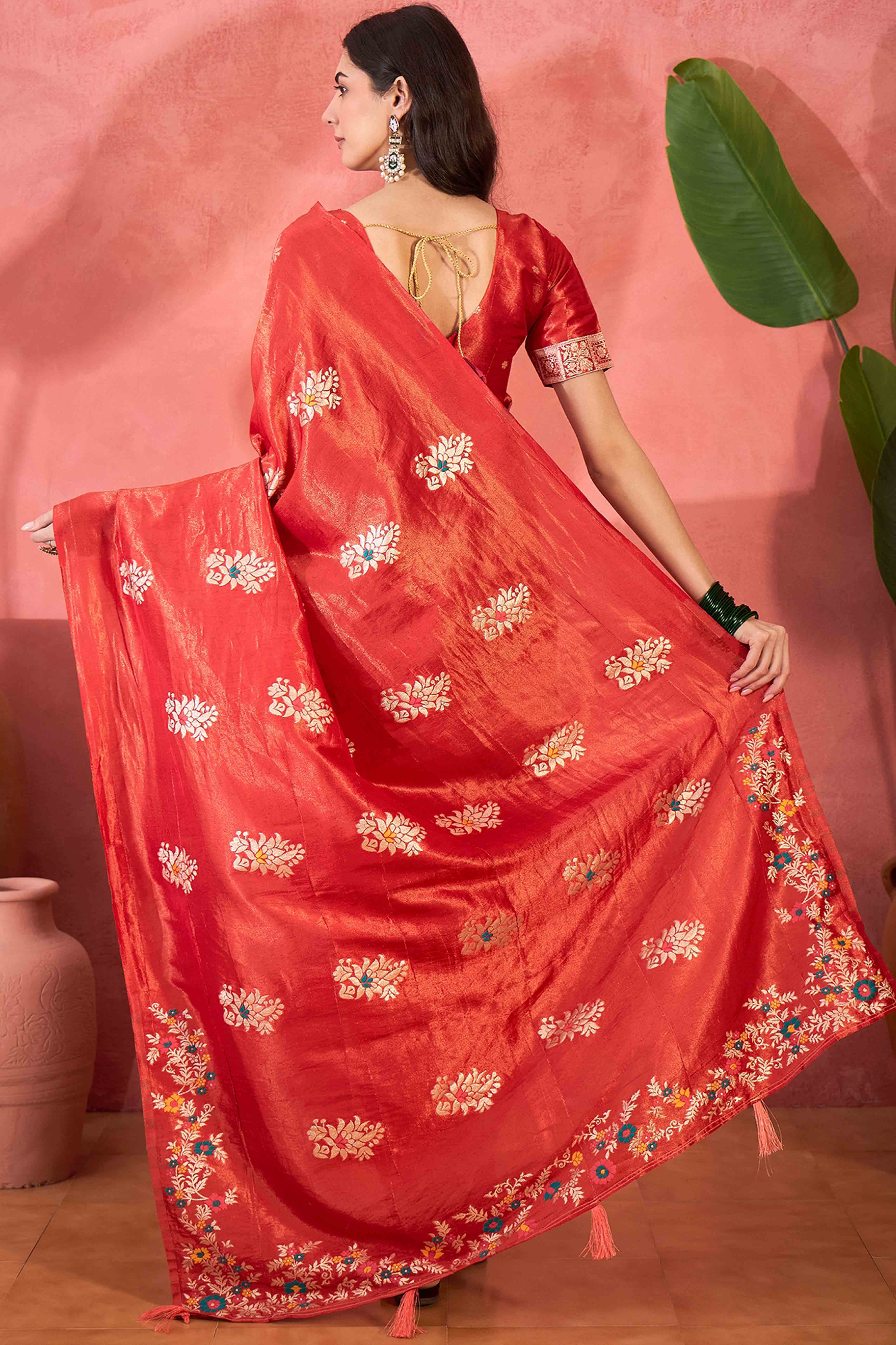 Red Shimmer Saree Showcasing Floral Zari Weaving & A Tasselled Pallu