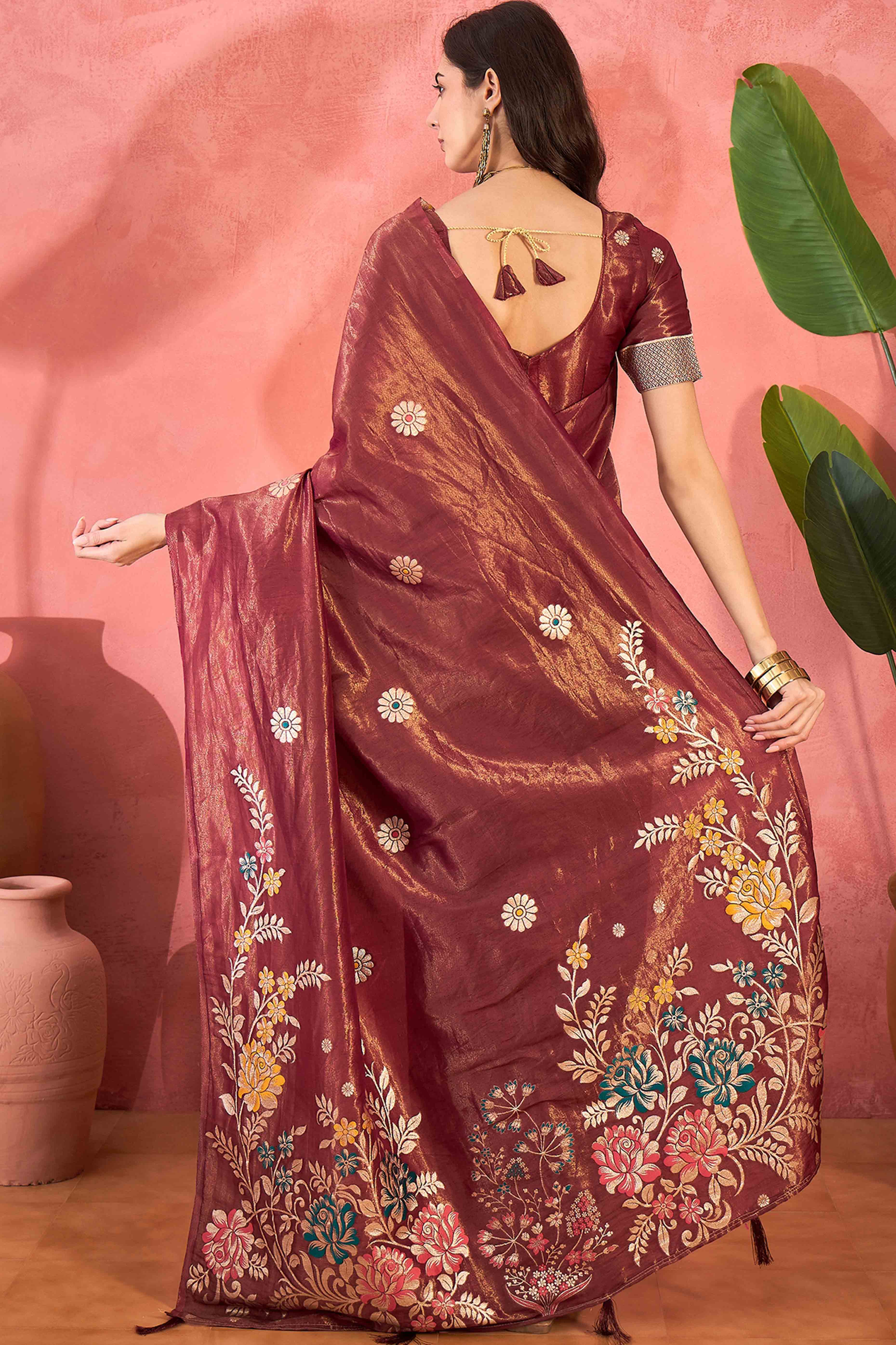 Maroon Shimmer Saree Adorned with Floral Zari Weaving & Tassel Pallu