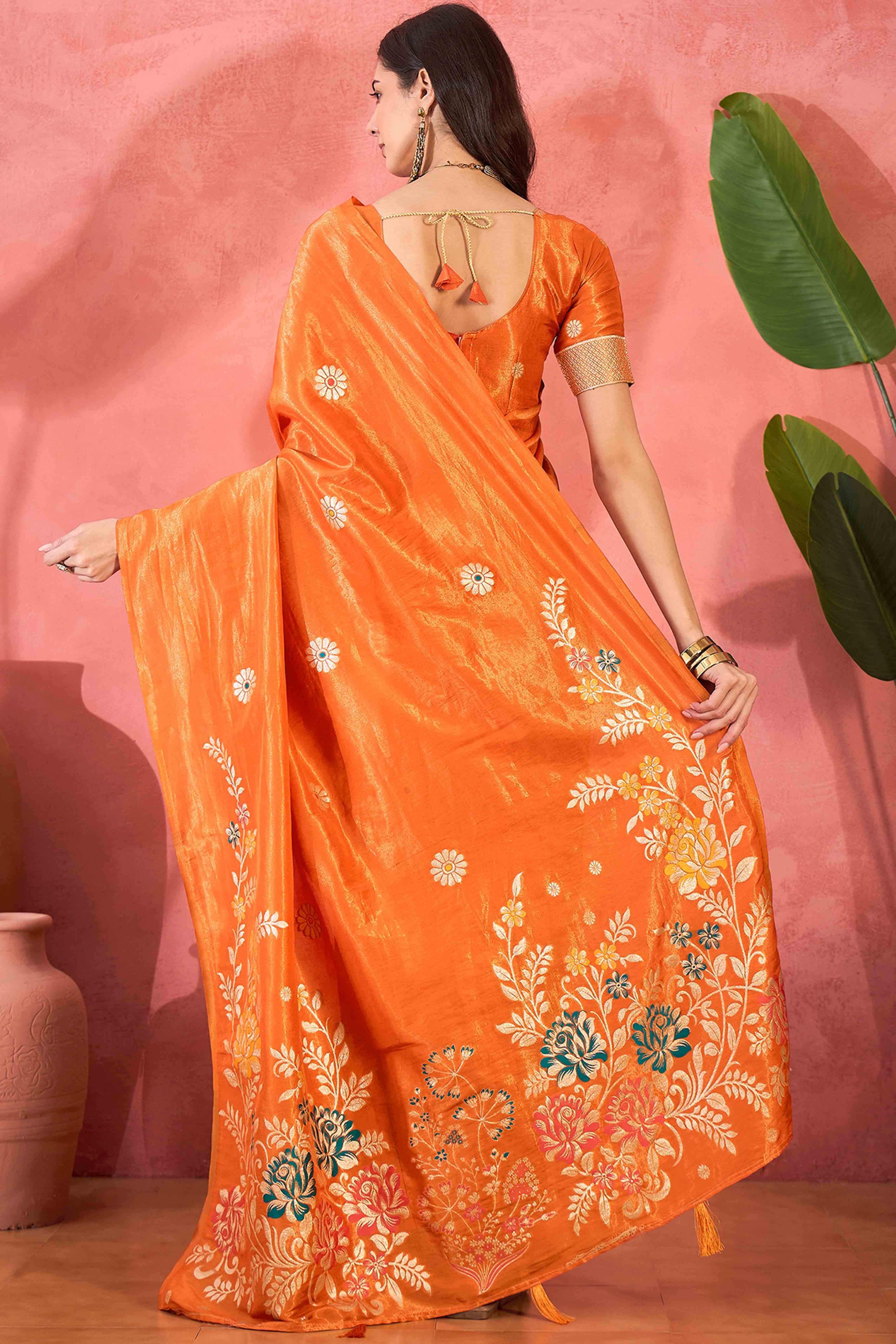 Orange Shimmer Saree Adorned with Floral Zari Weaving & Tassel Pallu