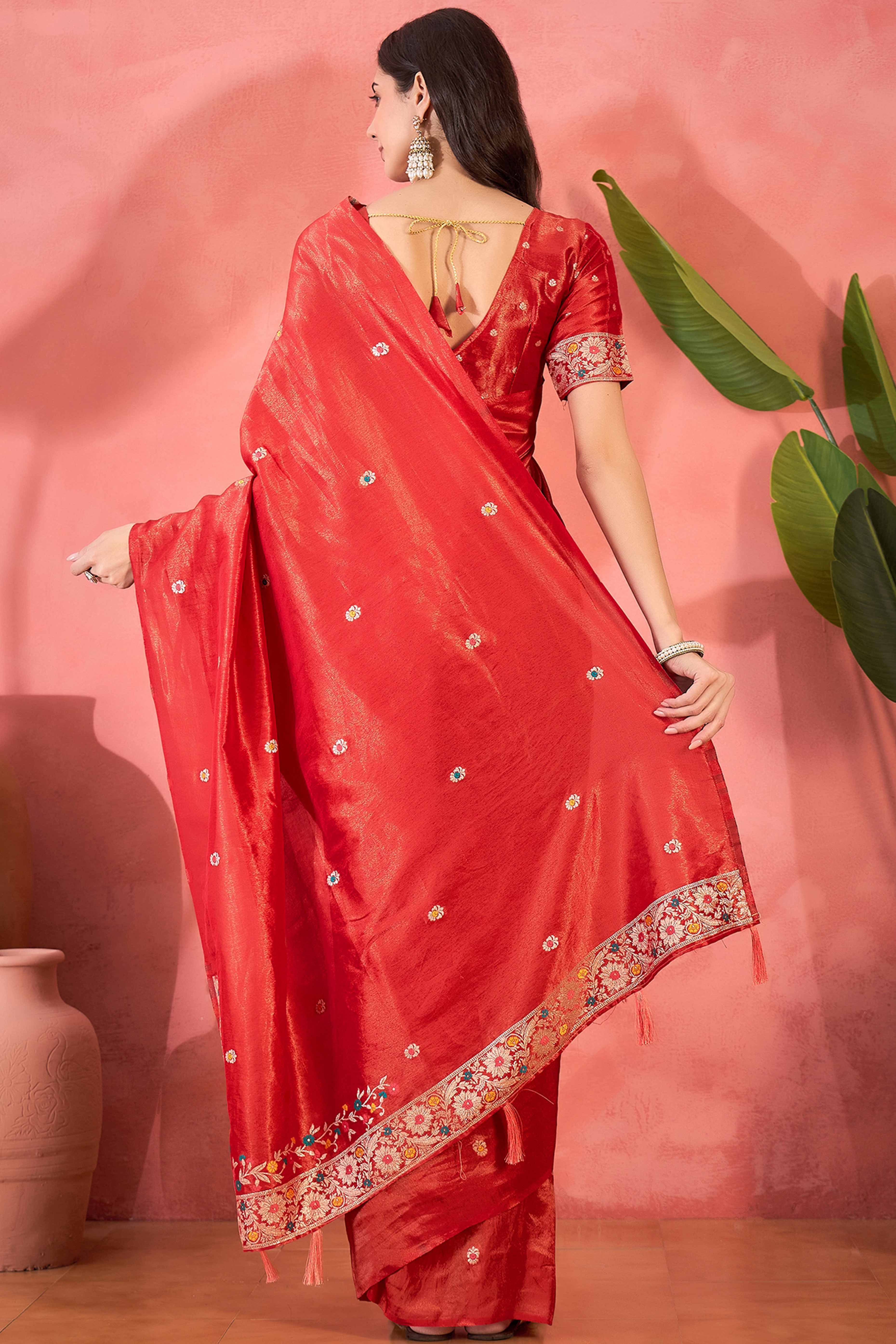 Red Zari Woven Shimmer Saree With Floral Motifs & Flowing Tassel Pallu