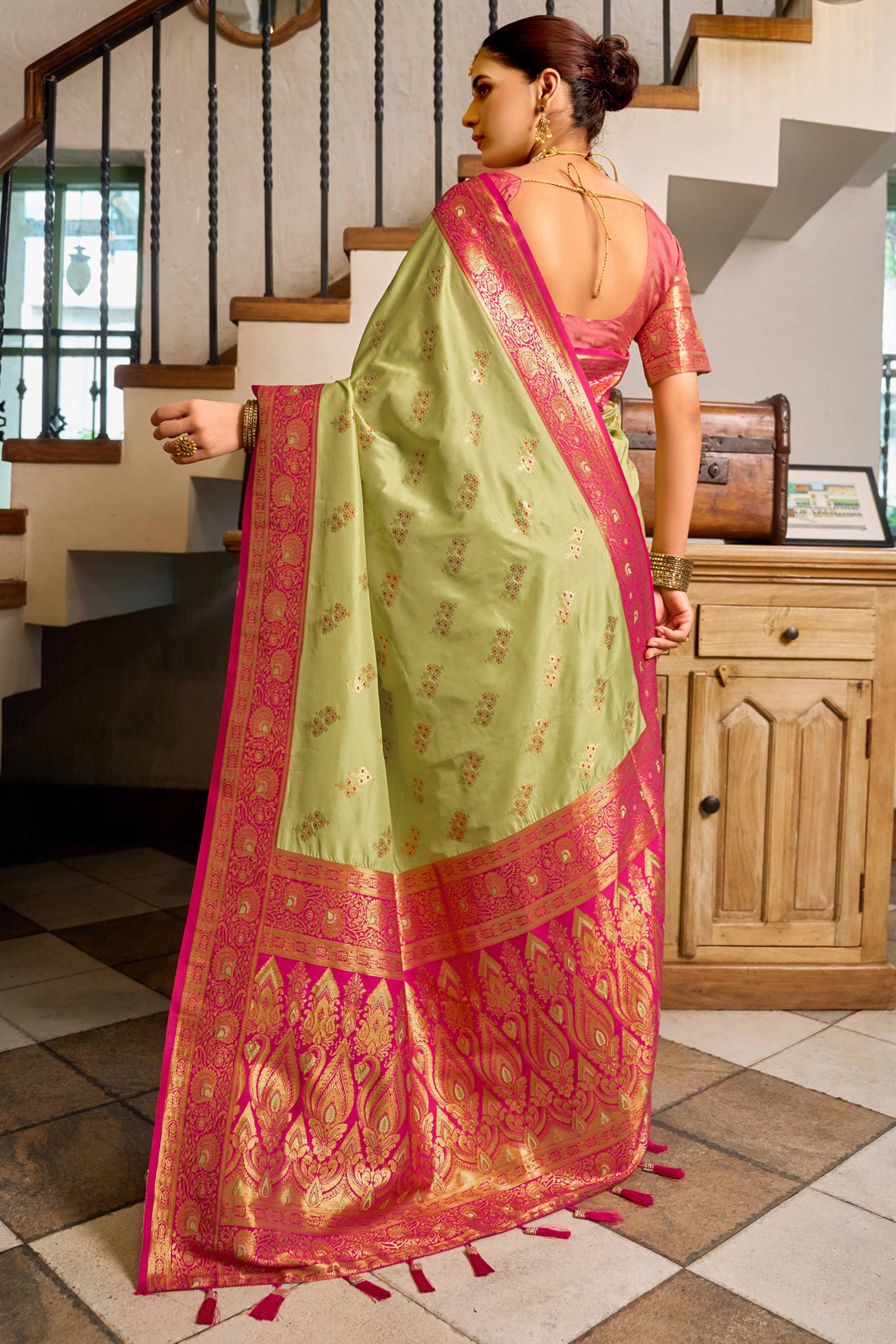 Pista Green Silk Blend Saree Featuring Intricate Floral Zari Work
