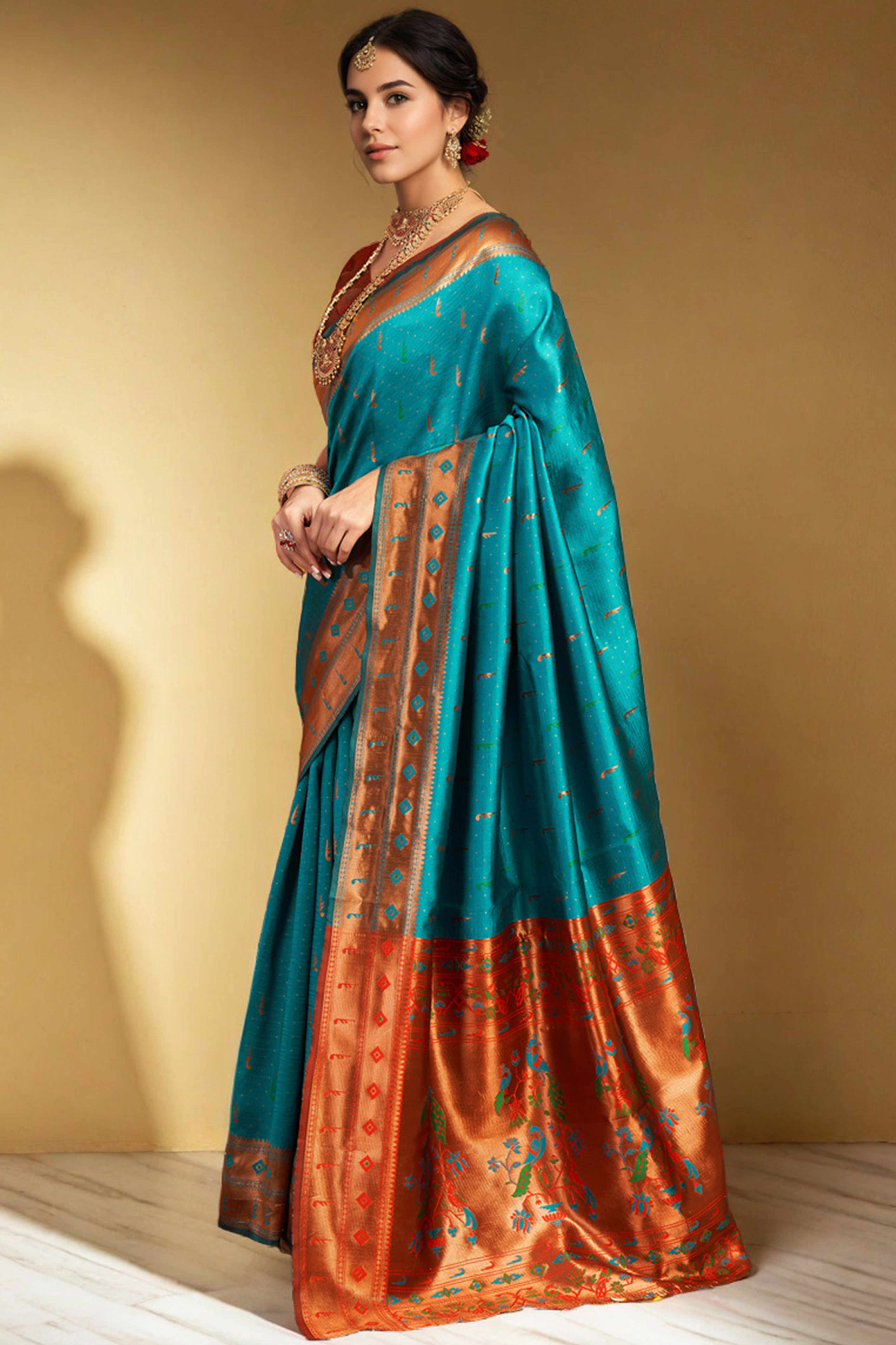 Rama Blue Silk Blend Paithani Saree Adorned With Zari Weaving & Peacock Motif Pallu