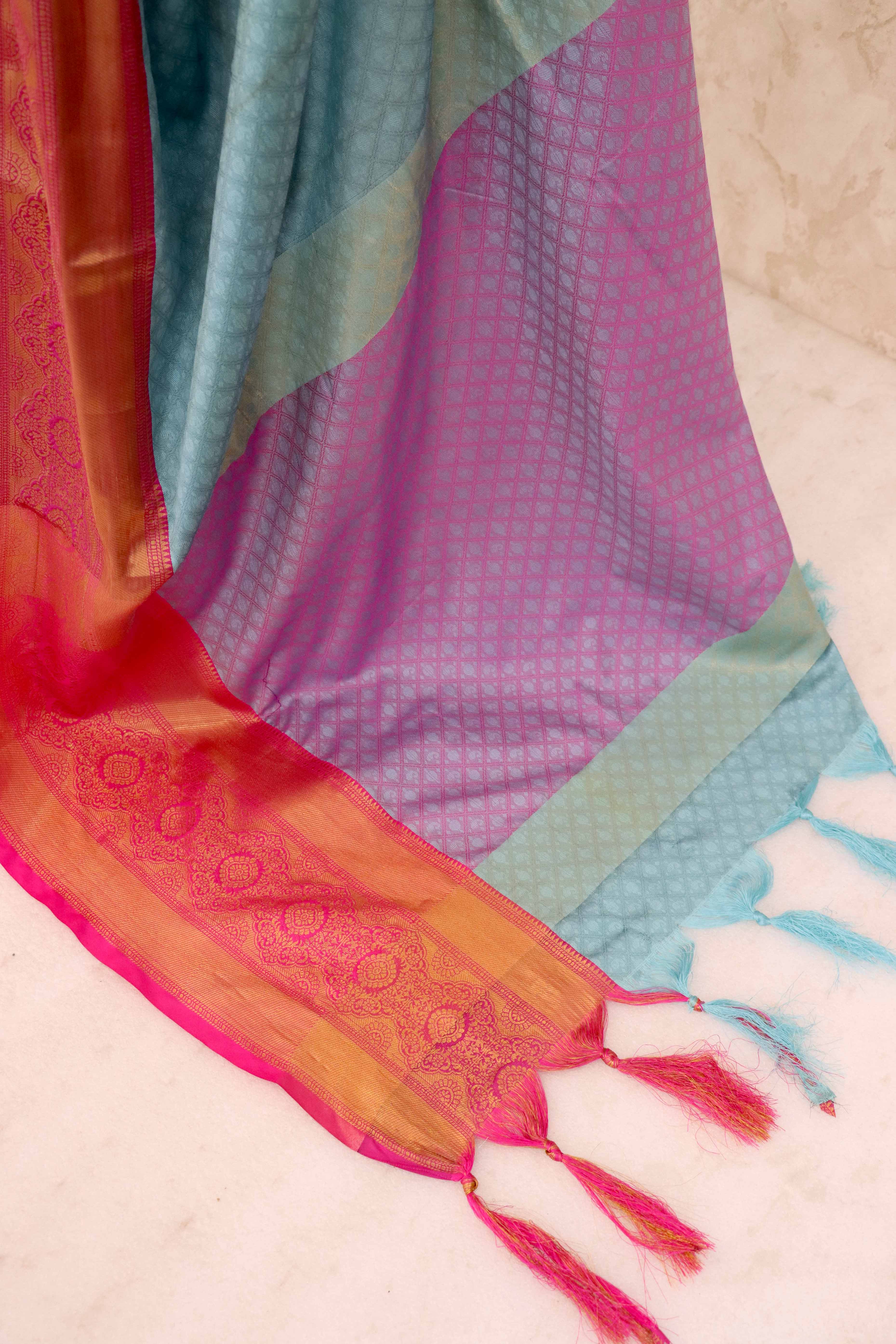 Sky Blue Silk Blend Saree With Detailed Zari Weaving & Tassel Embellishments