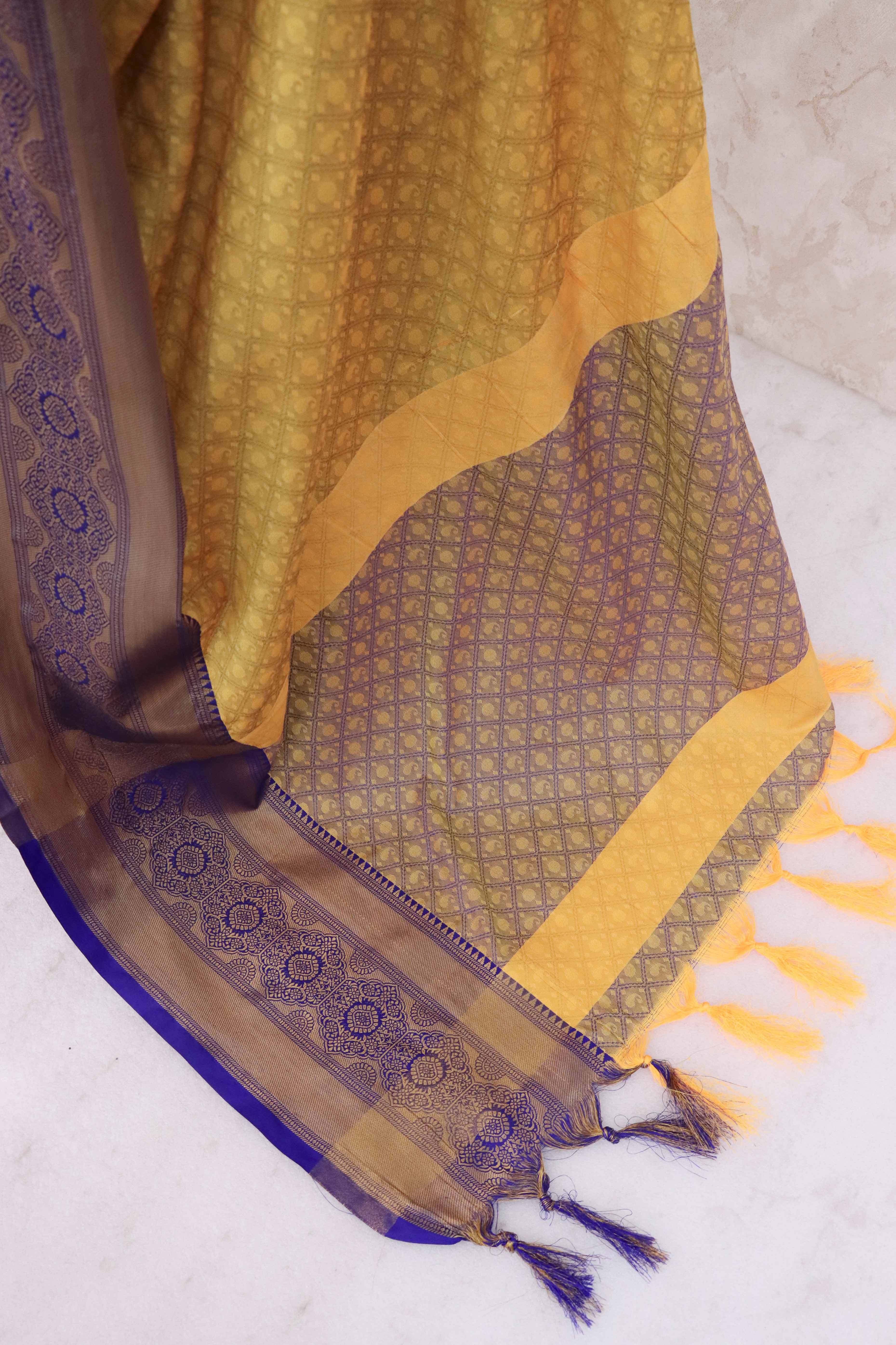 Mustard Silk Blend Saree With Detailed Zari Weaving & Tassel Embellishments