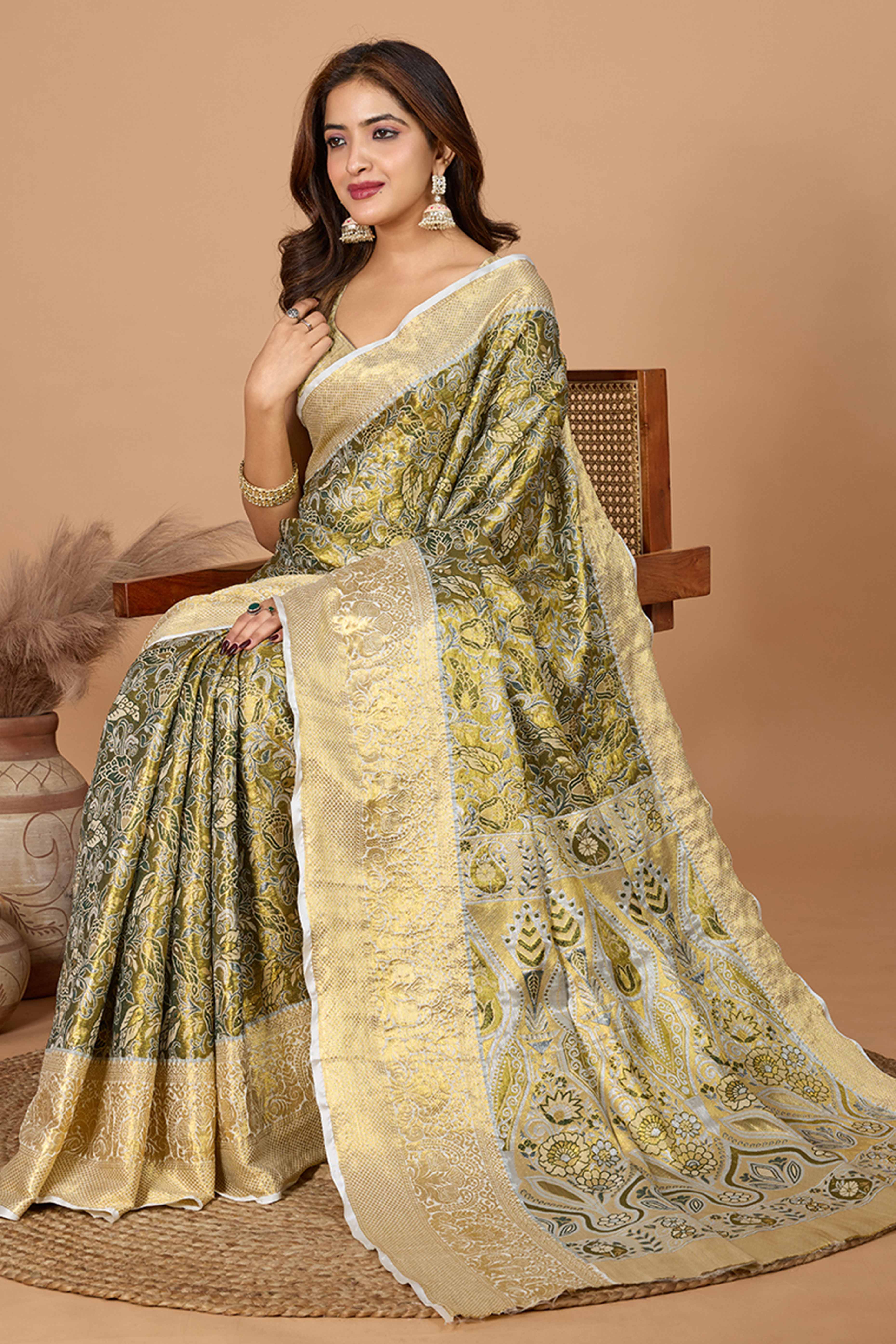 Mahendi Green Kanjivaram Silk Saree Adorned With Exquisite Floral Zari Weaving