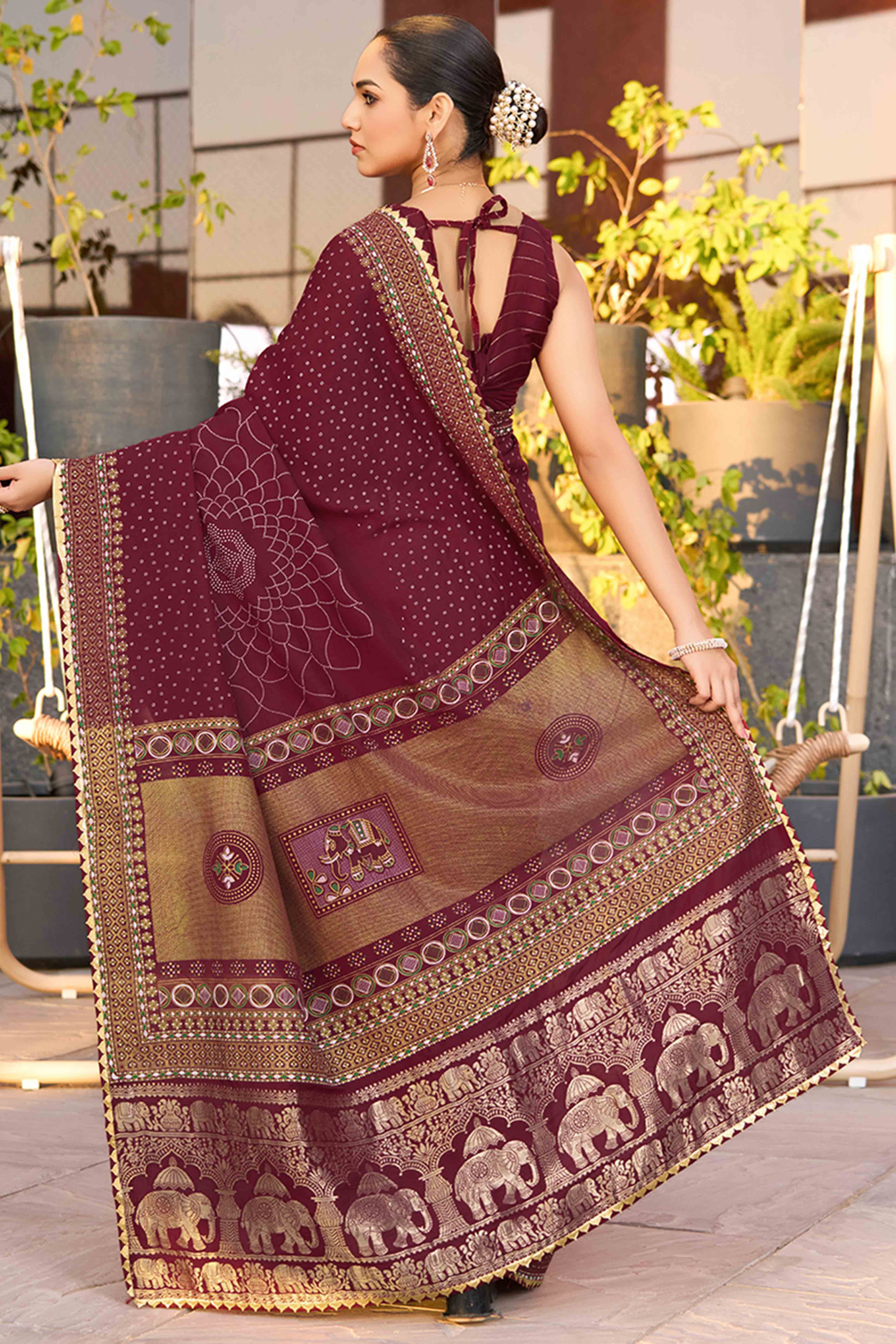 Feel The Luxury Of Maroon Bandhani Foil Printed Cotton Silk Sarree With Lace Border