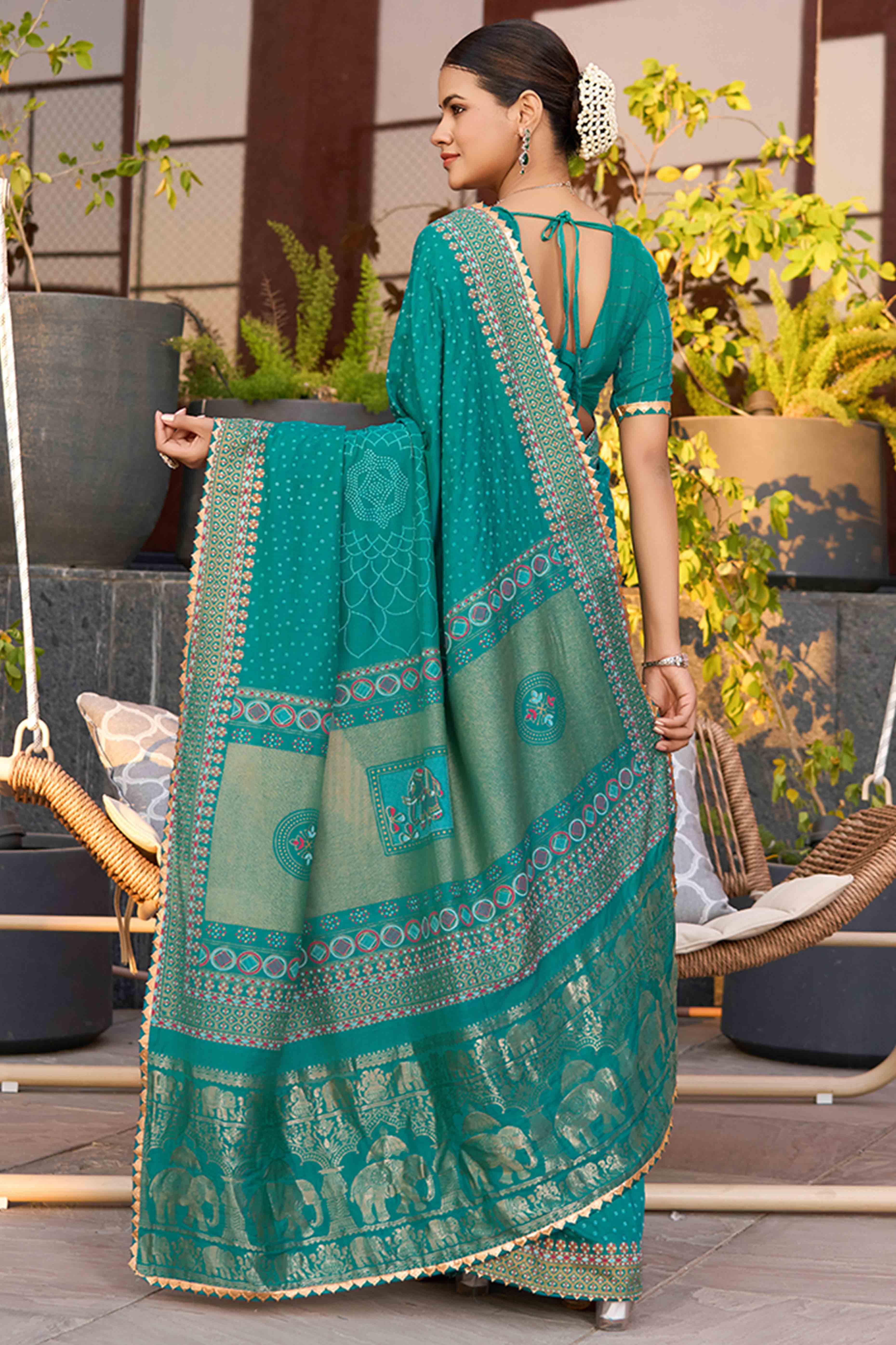 Drape Yourself In The Charm Of Rama Blue Bandhani Foil Printed Cotton Silk Sarree With Lace Border