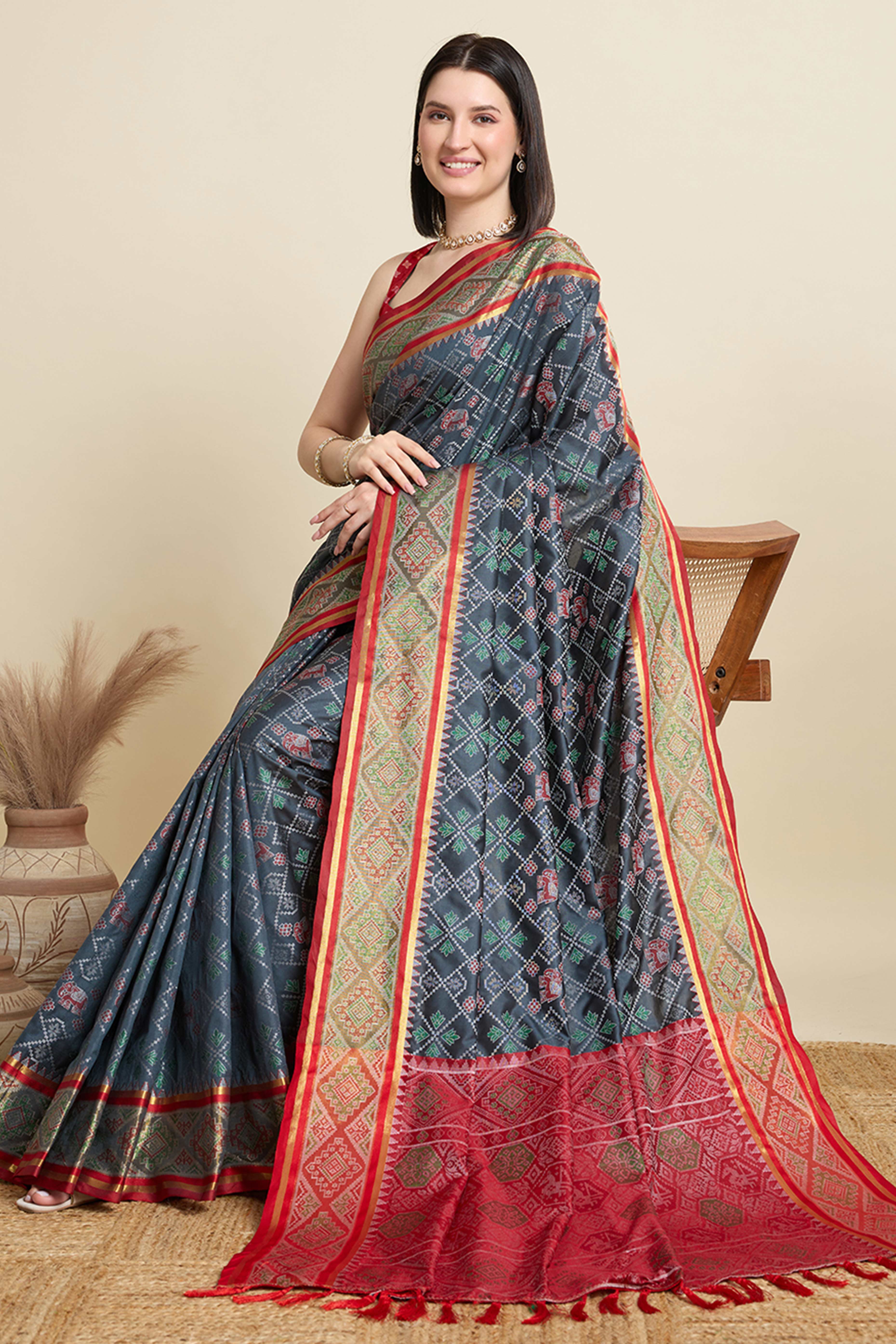 Grey Silk Blend Saree Featuring Patola Prints and a Detailed Weaving Border