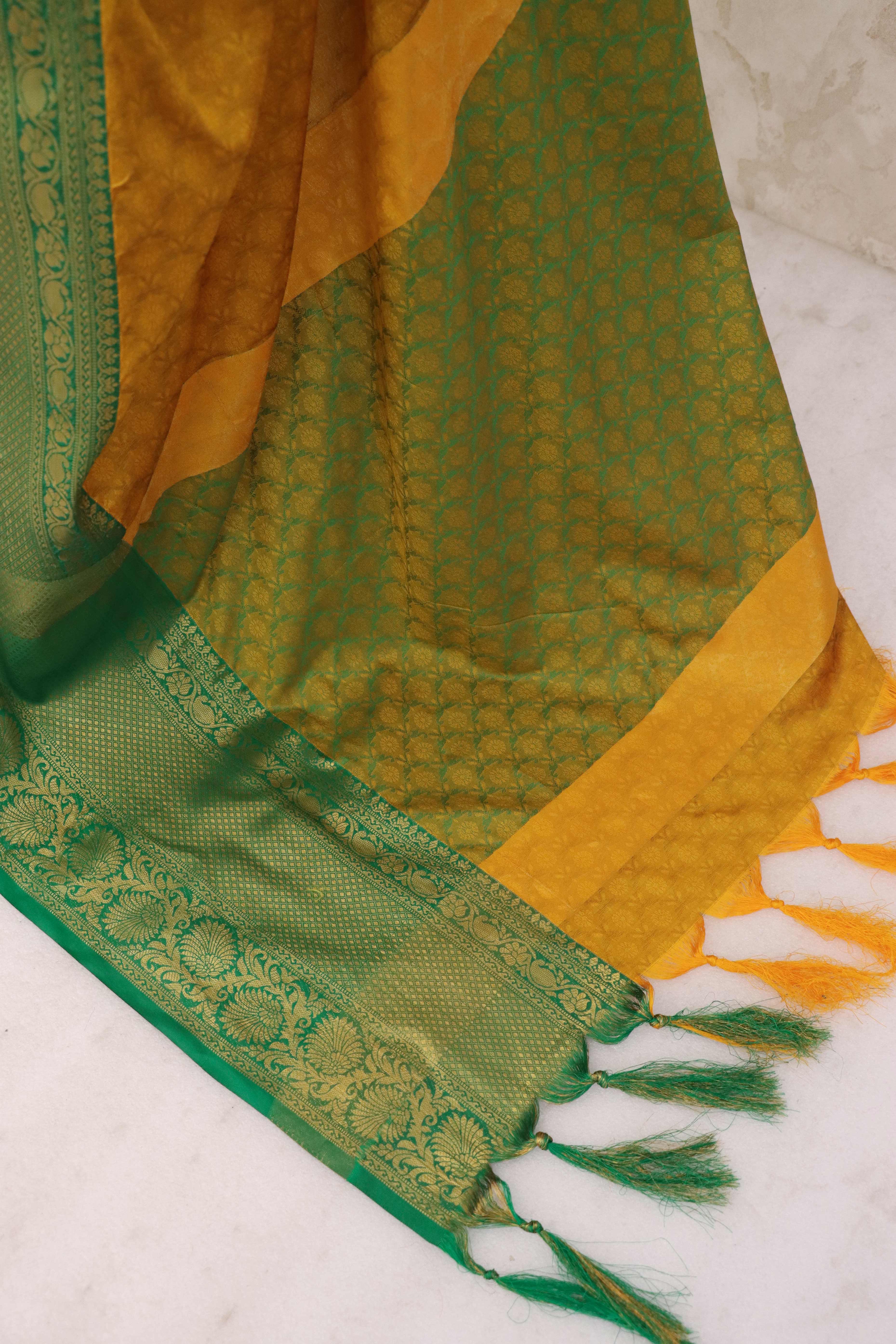 Mustard Silk Blend Saree With Detailed Zari Weaving & Tassel Embellishments