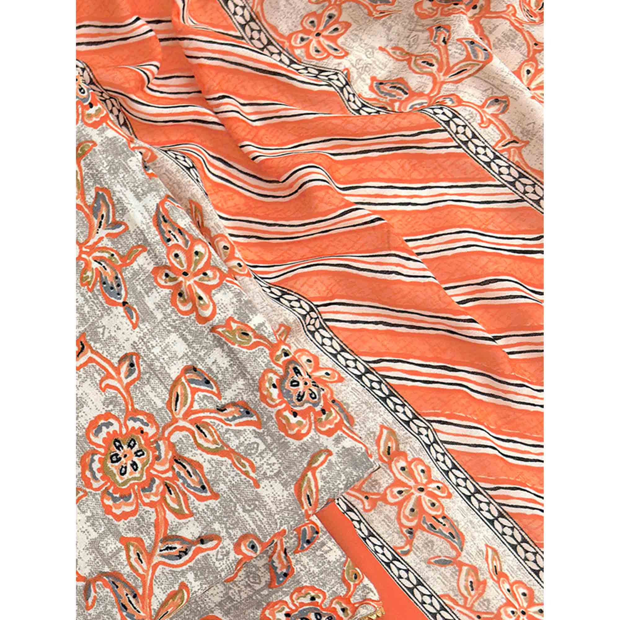 Charming Orange Floral Printed Cotton Blend Dress Material Featuring Intricate Lace Border