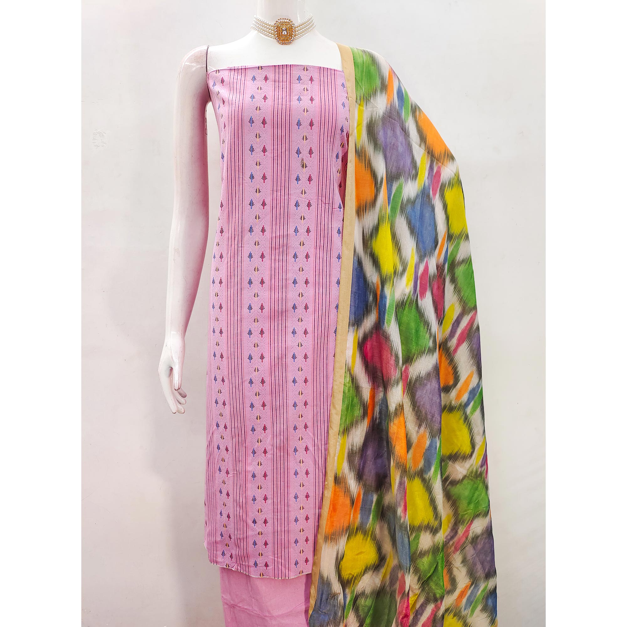 A Mesmerizing Creation Pink Woven Cotton Blend Dress Material